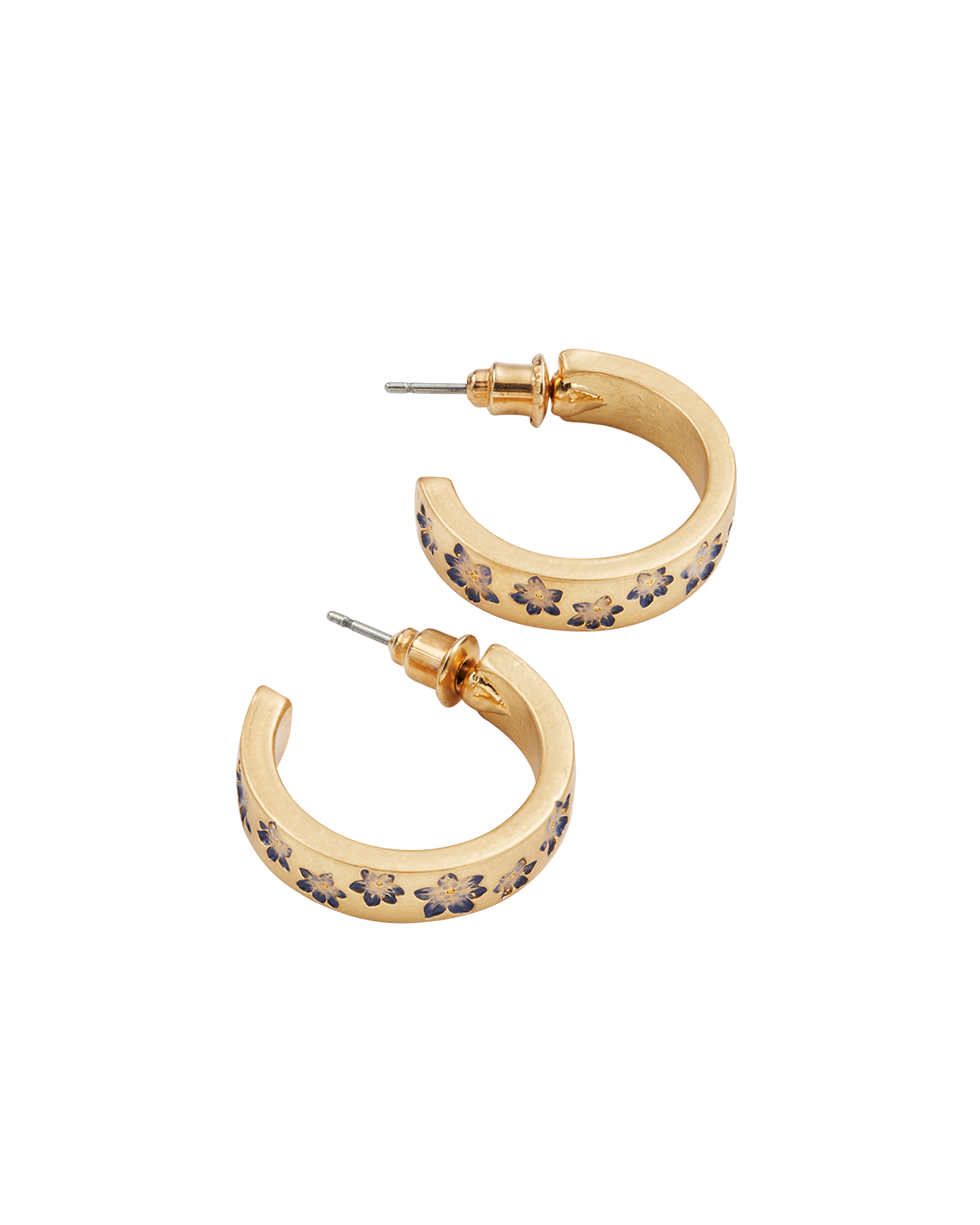 Gold hoop earrings with floral designs on a white background