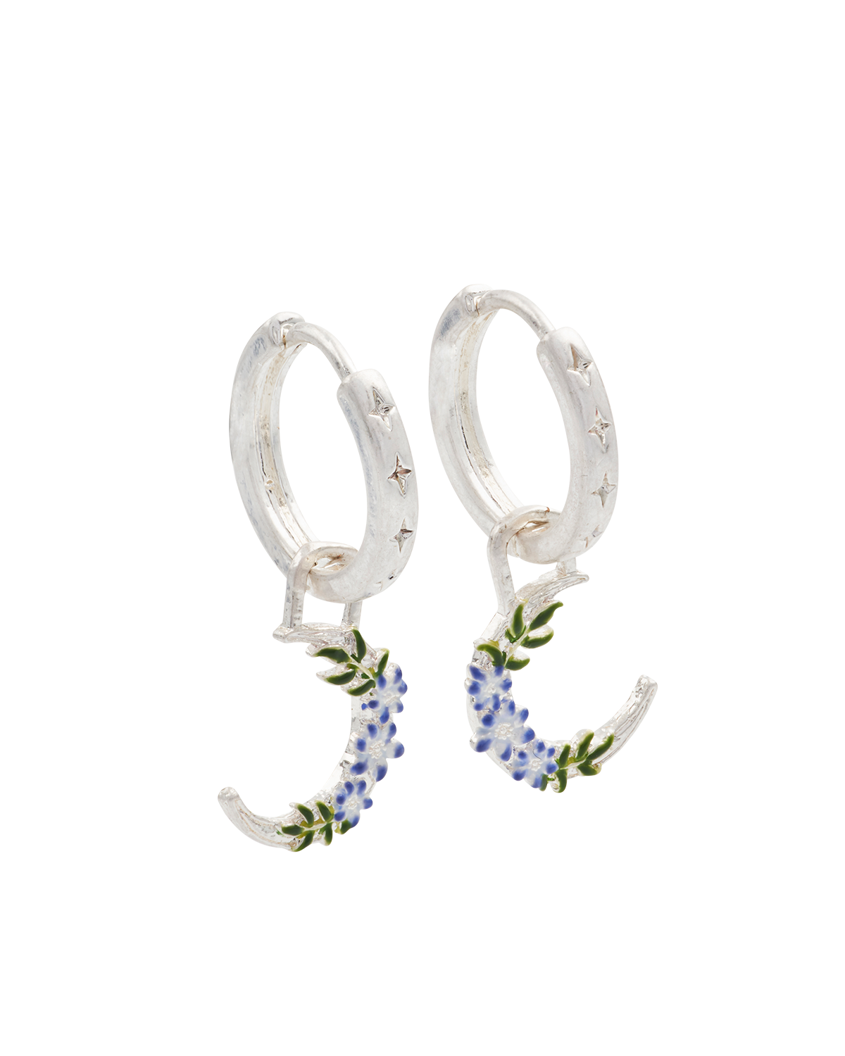 Silver huggie earrings with floral moon design on a white background