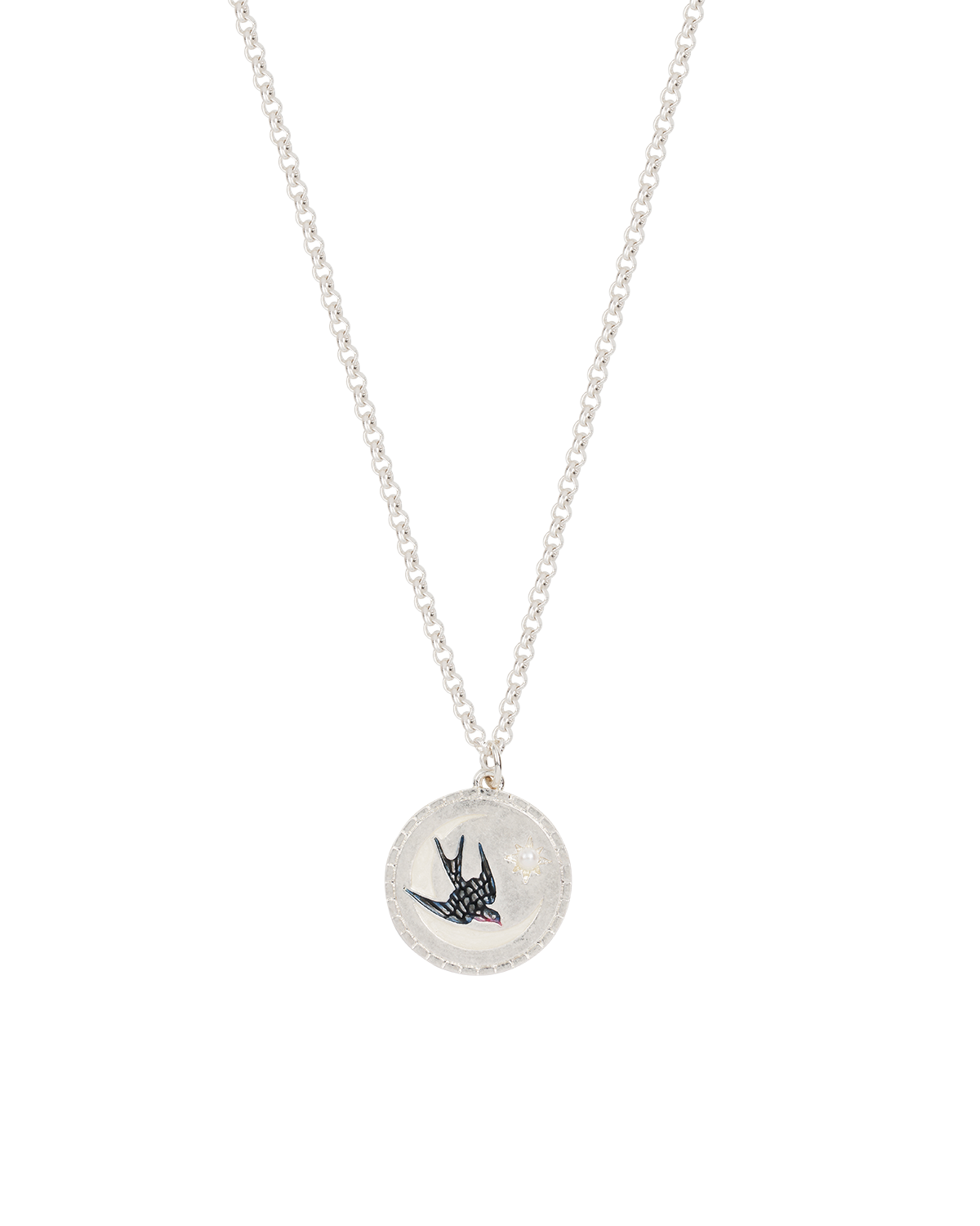 Silver necklace with a round pendant featuring a swallow bird design on a white background