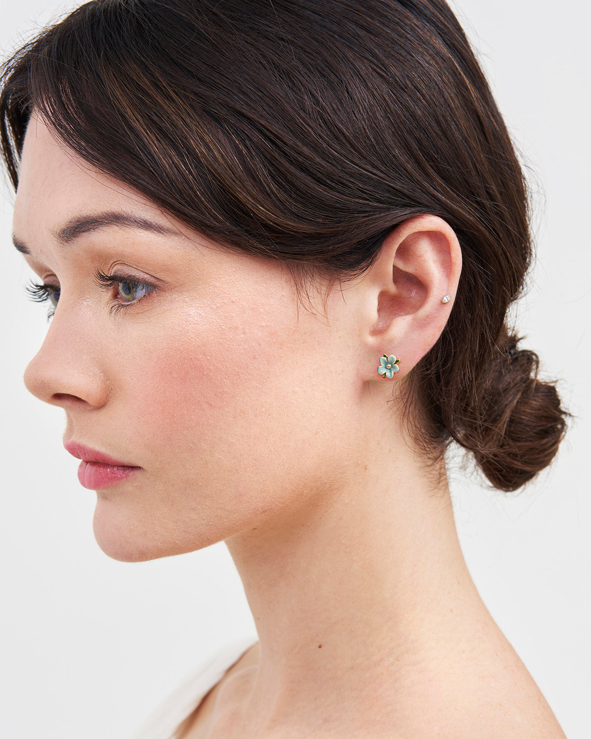 Gold Forget Me Not Flora Stud Earrings on model