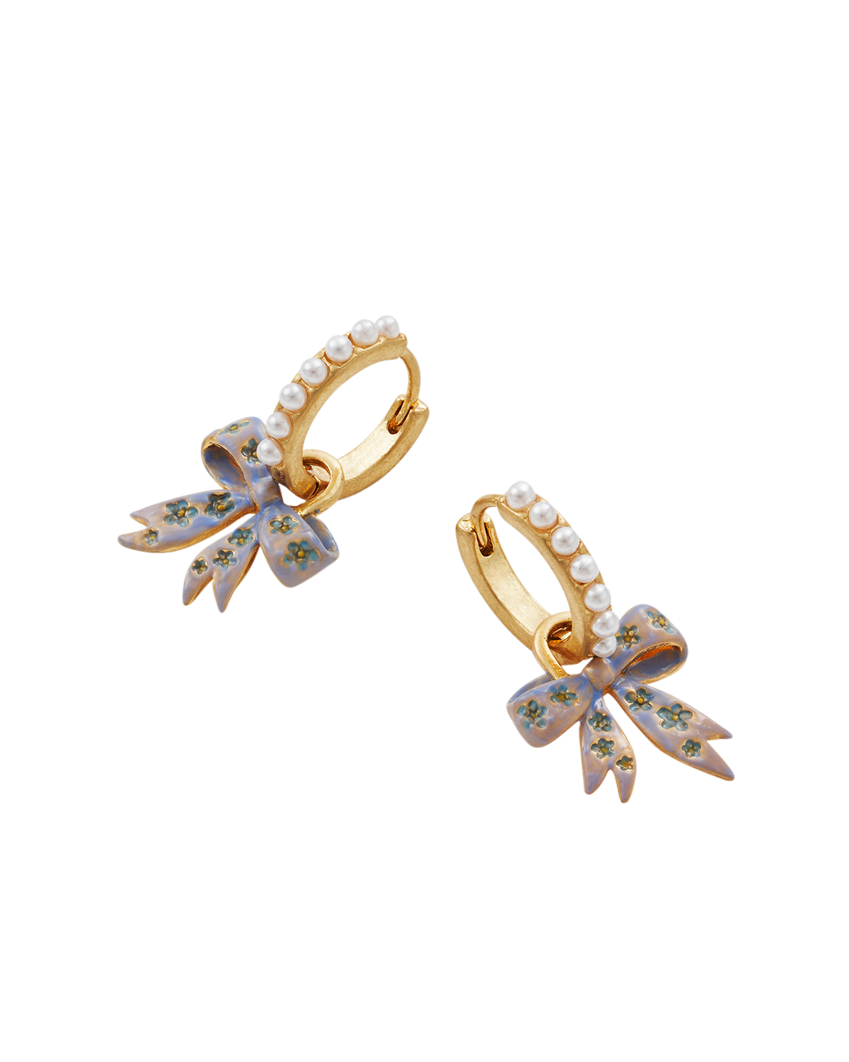 Gold Forget Me Not Bow Huggie Earrings on a white background