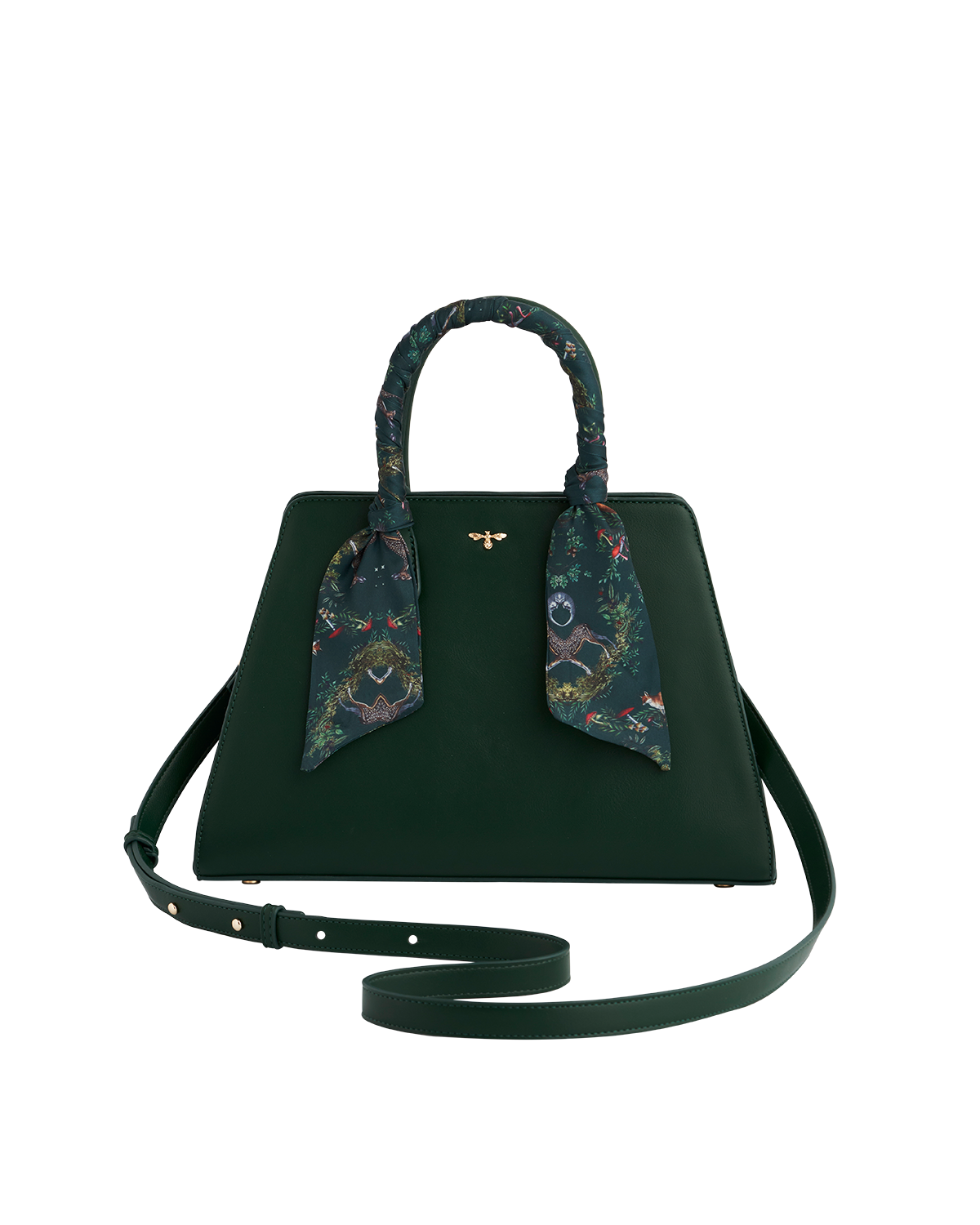 Green handbag with woodland print scarf on handle and crossbody strap on a white background