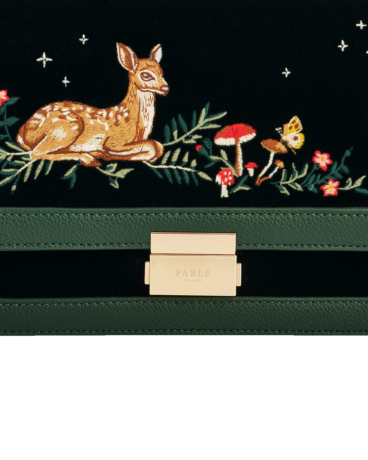 Green handbag with embroidered fawn and nature-themed design, featuring the brand 'Fable England'.
