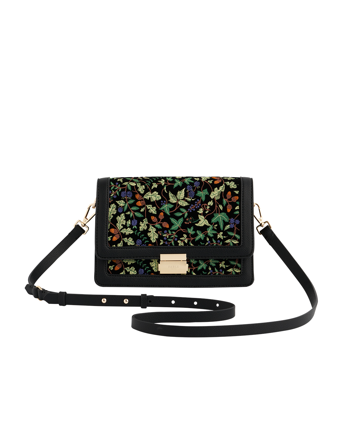 Oak leaf patterned handbag with black strap on a white background