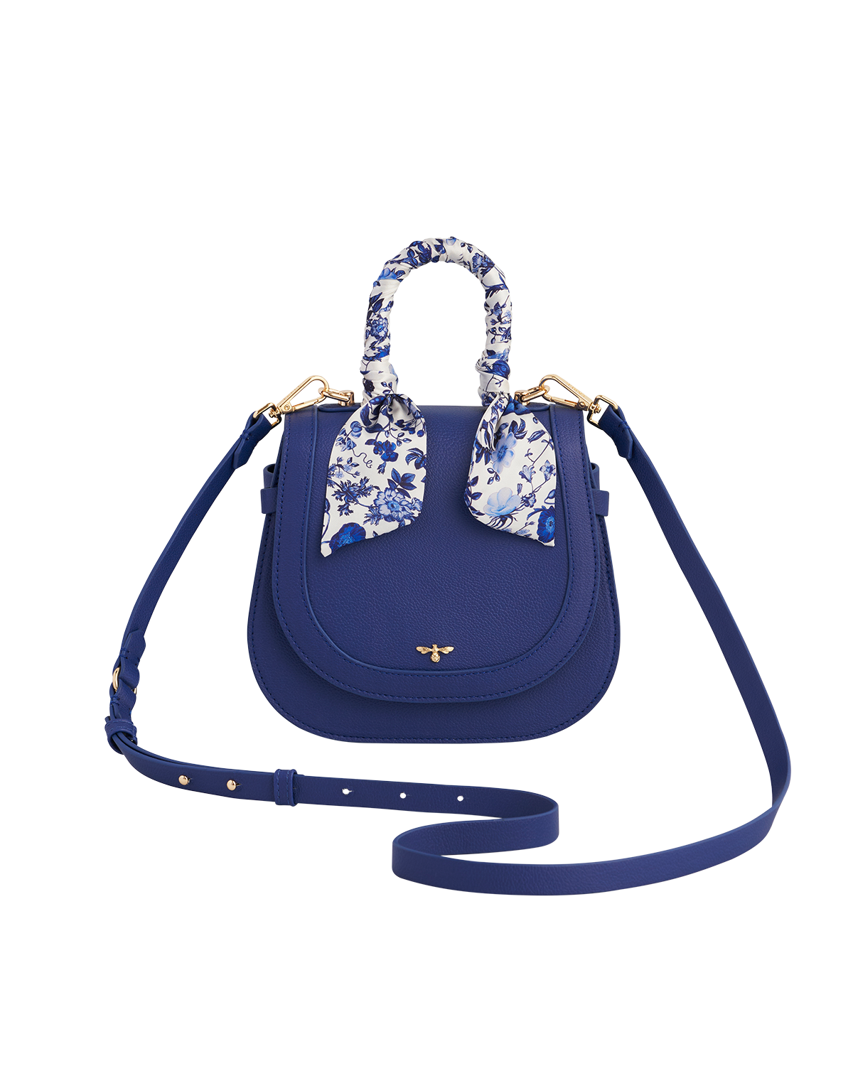 Blue handbag with floral scarf wrapped handle on a white background