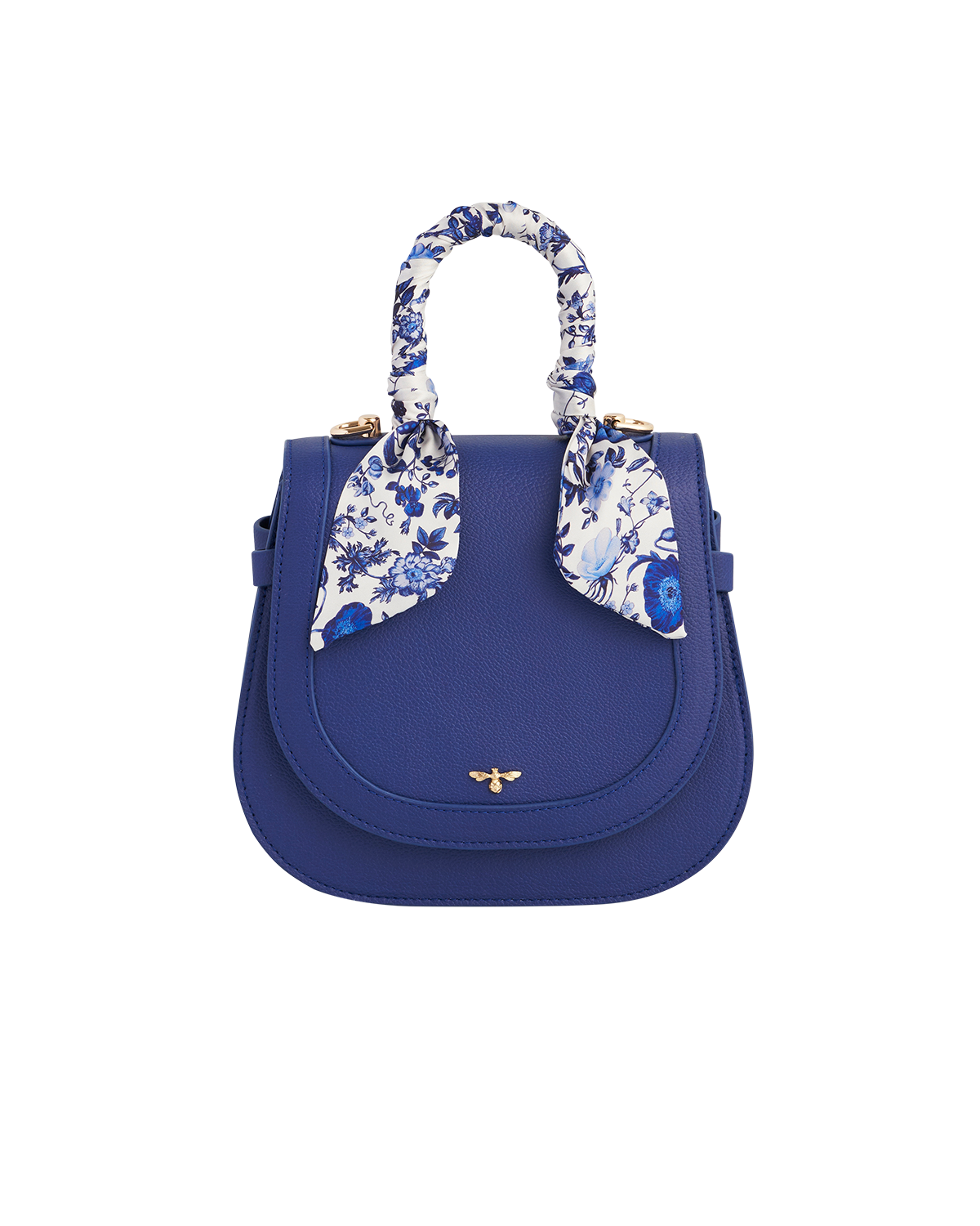 Blue handbag with white floral scarf wrapped handle on a white background