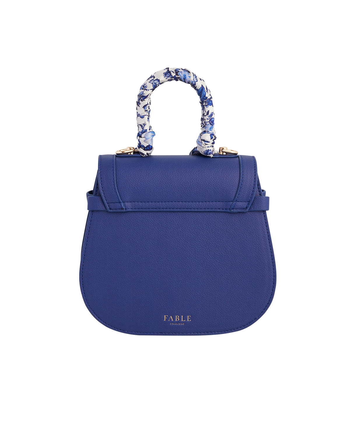 Blue handbag with scarf wrapped floral handle on a white background
