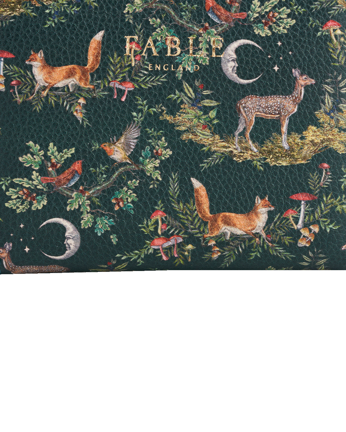 Patterned fabric with foxes, deer, and birds on a dark green background, featuring the brand 'Fable England'.
