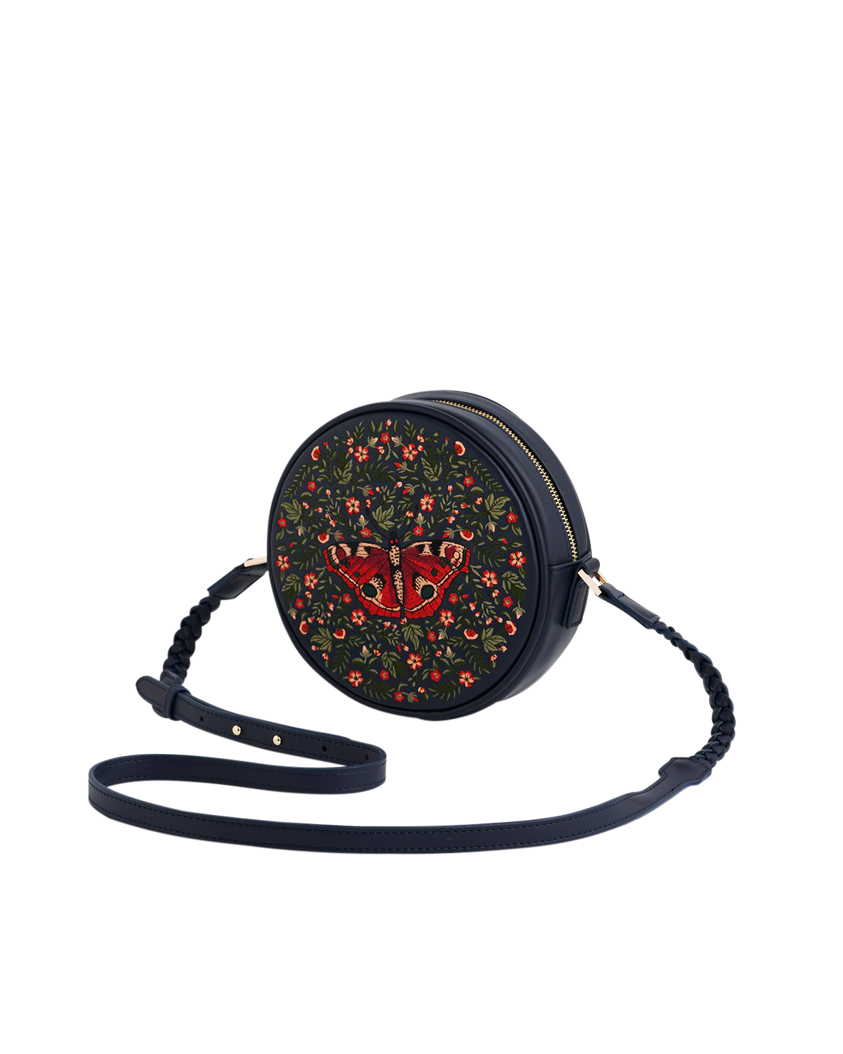 Round crossbody bag with floral pattern and brand logo on a white background