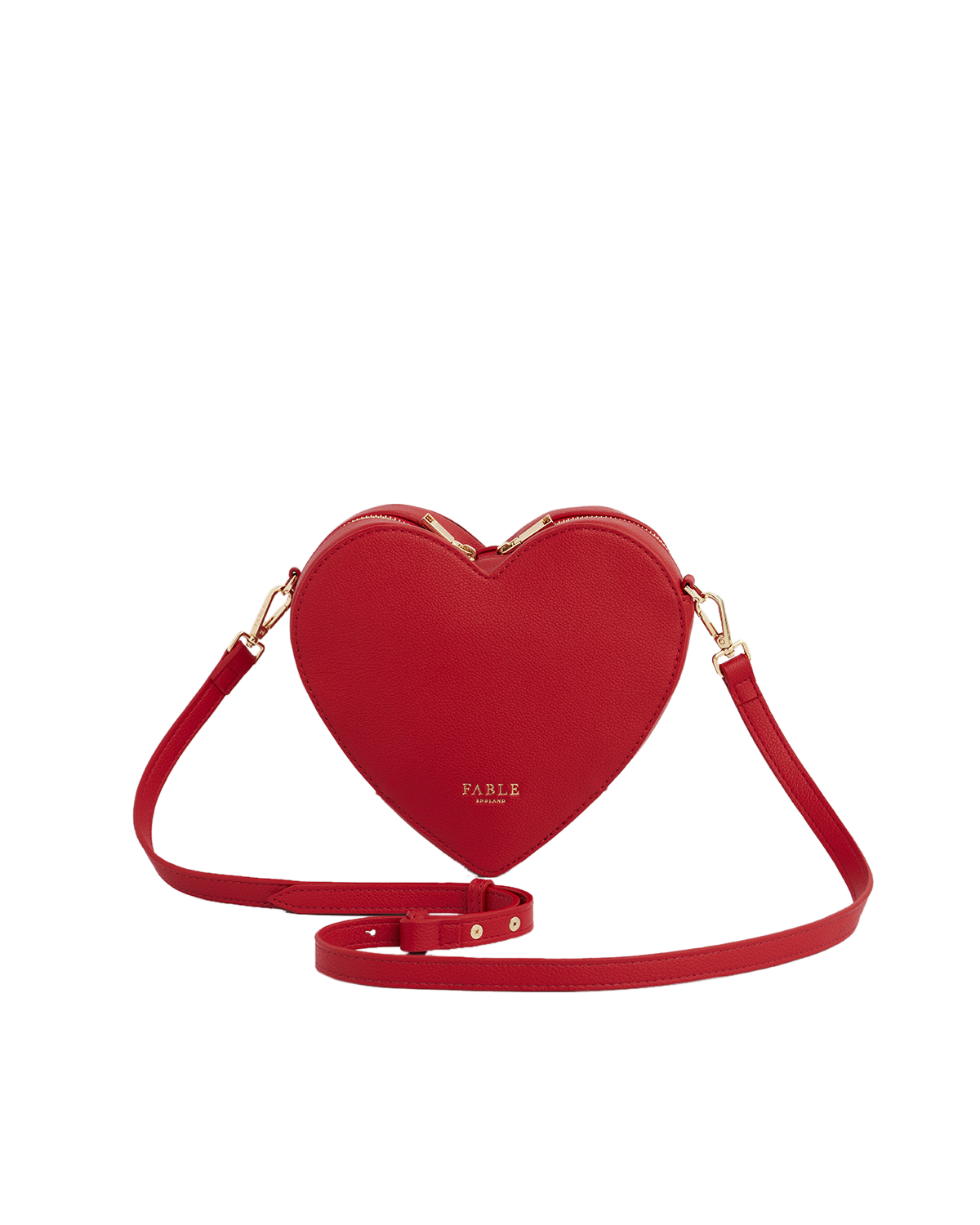 Red heart-shaped handbag with 'Fable' branding on a white background