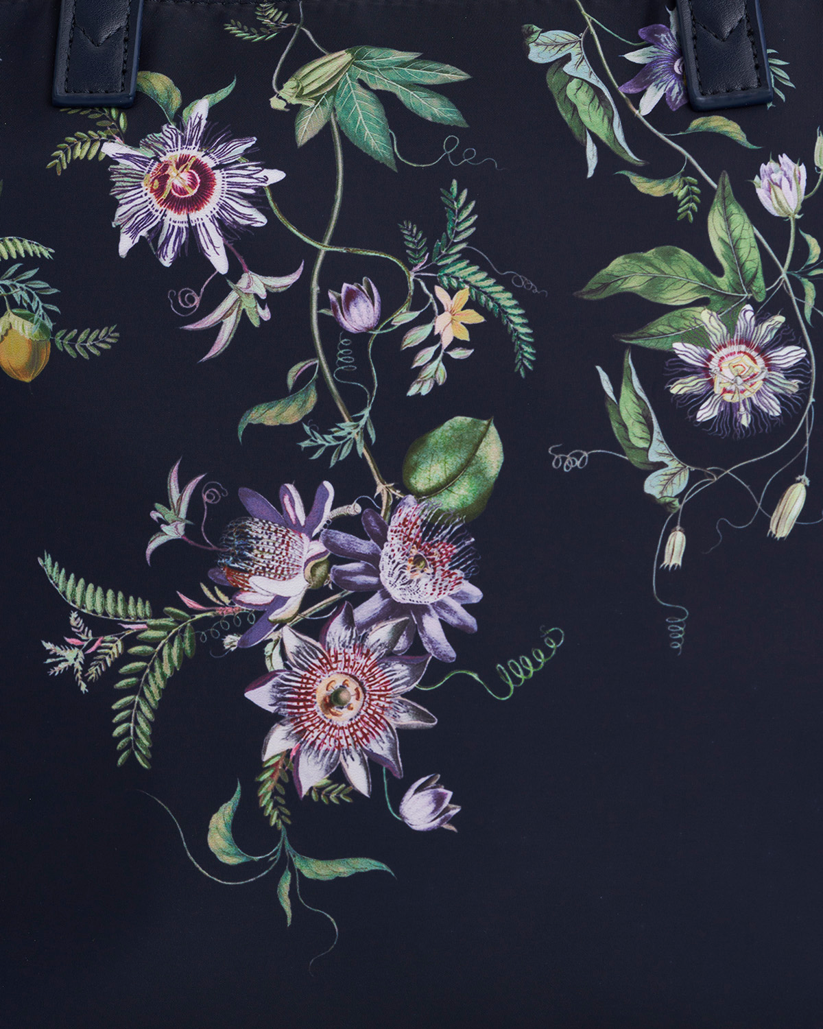 Floral pattern with purple and green flowers on a dark background