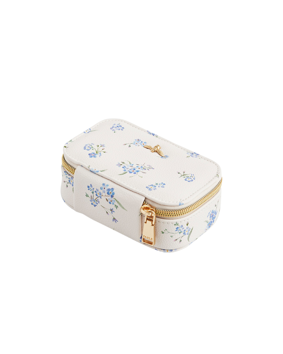 Small white jewelry box with floral patterns and a gold zipper on a white background