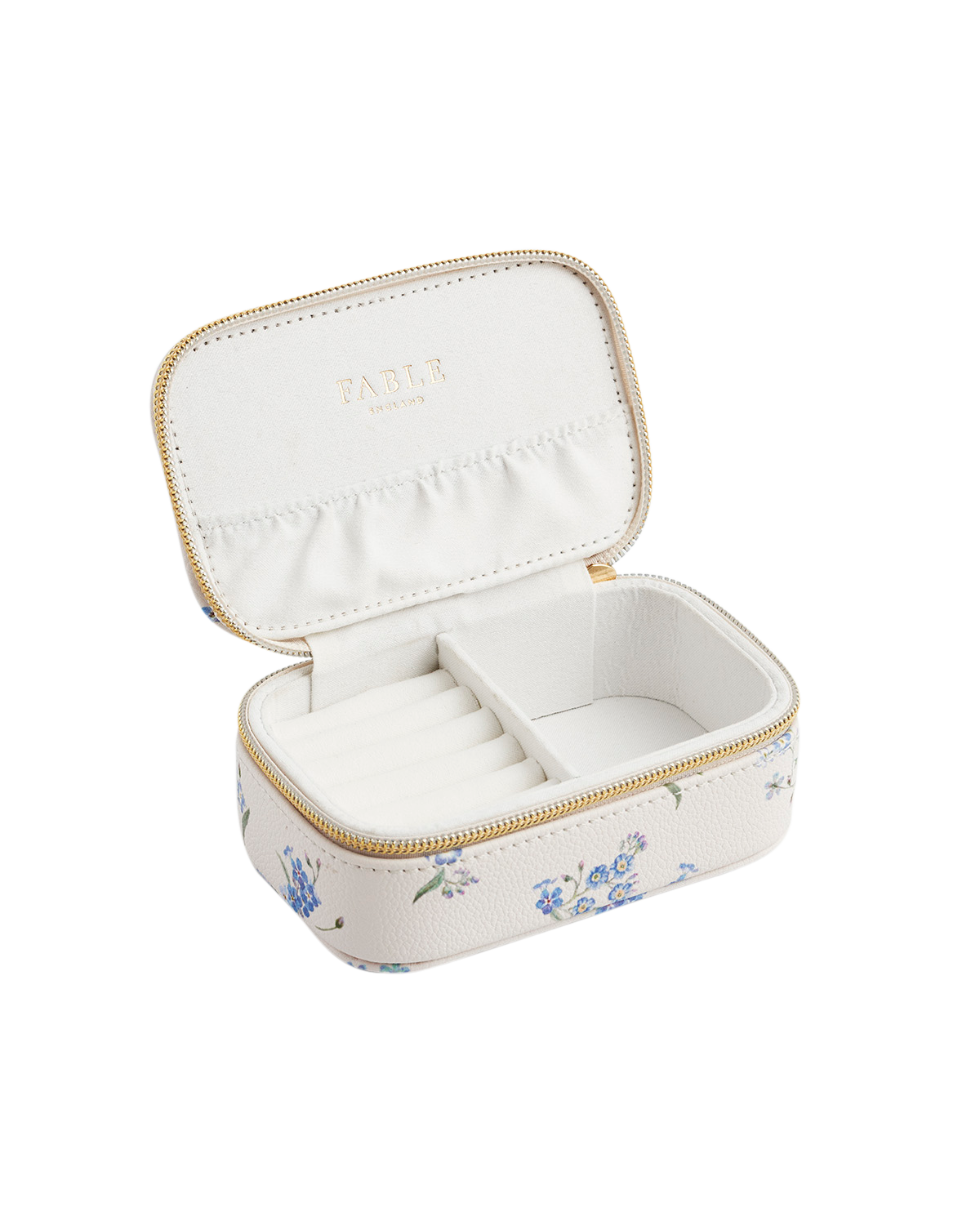 Open jewelry box with floral design on a white background