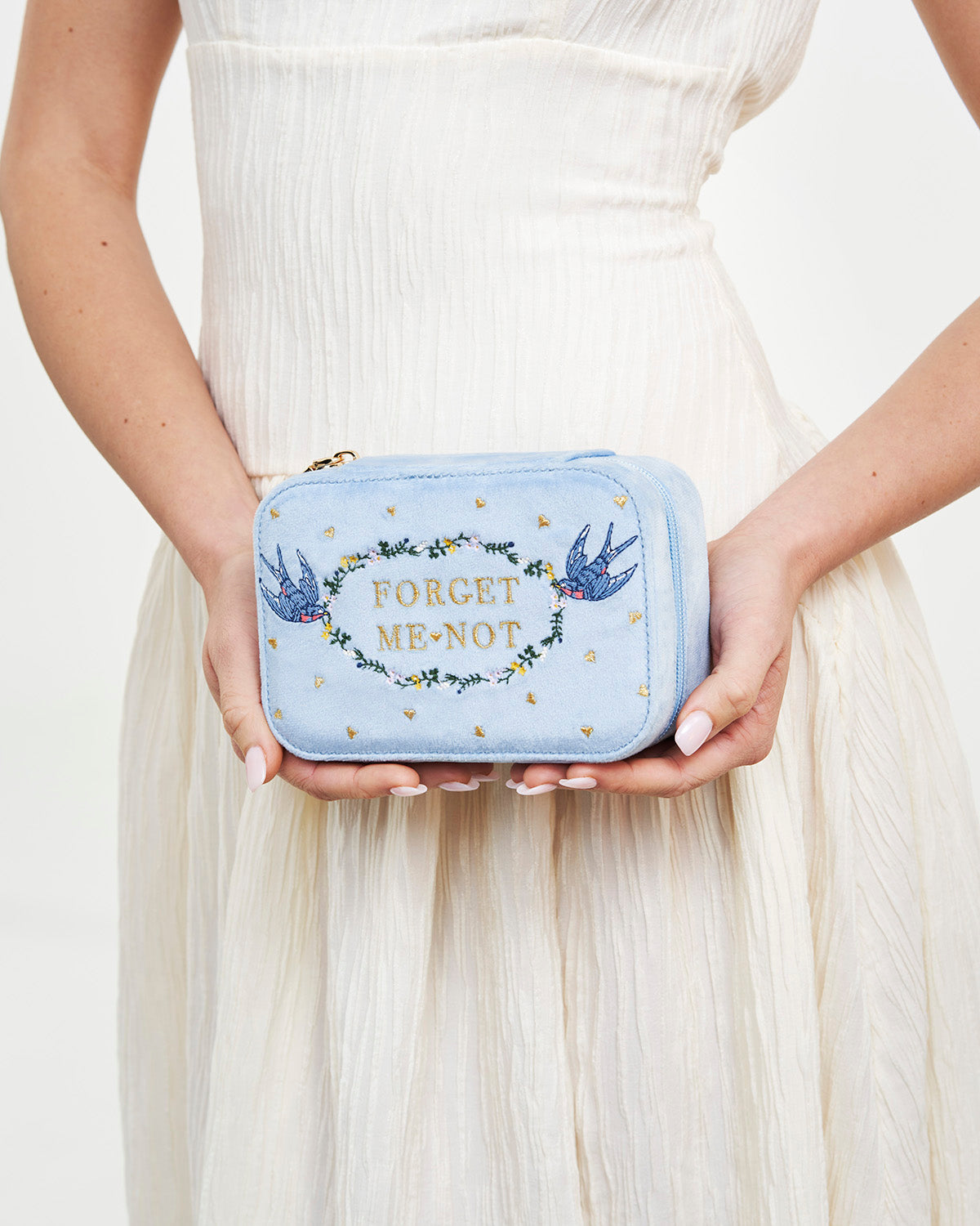 Blue Forget Me Not Velvet Embroidered Jewellery Box Large held by a person wearing a white dress