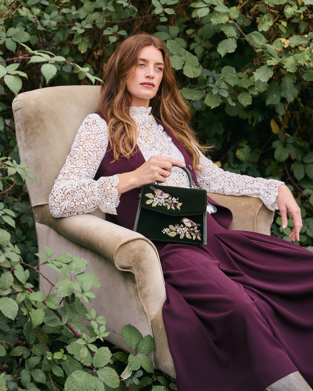 Eliza Wren Embroidered Top handle bag in Green Velvet styled