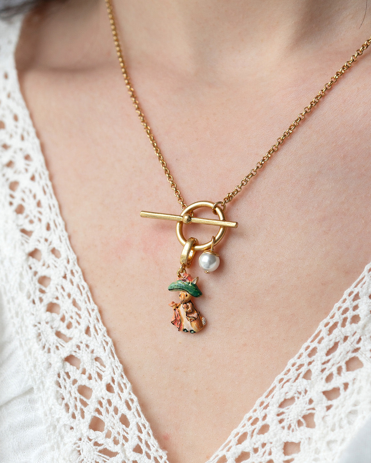 Benjamin Button peter rabbit charm on gold toggle necklace