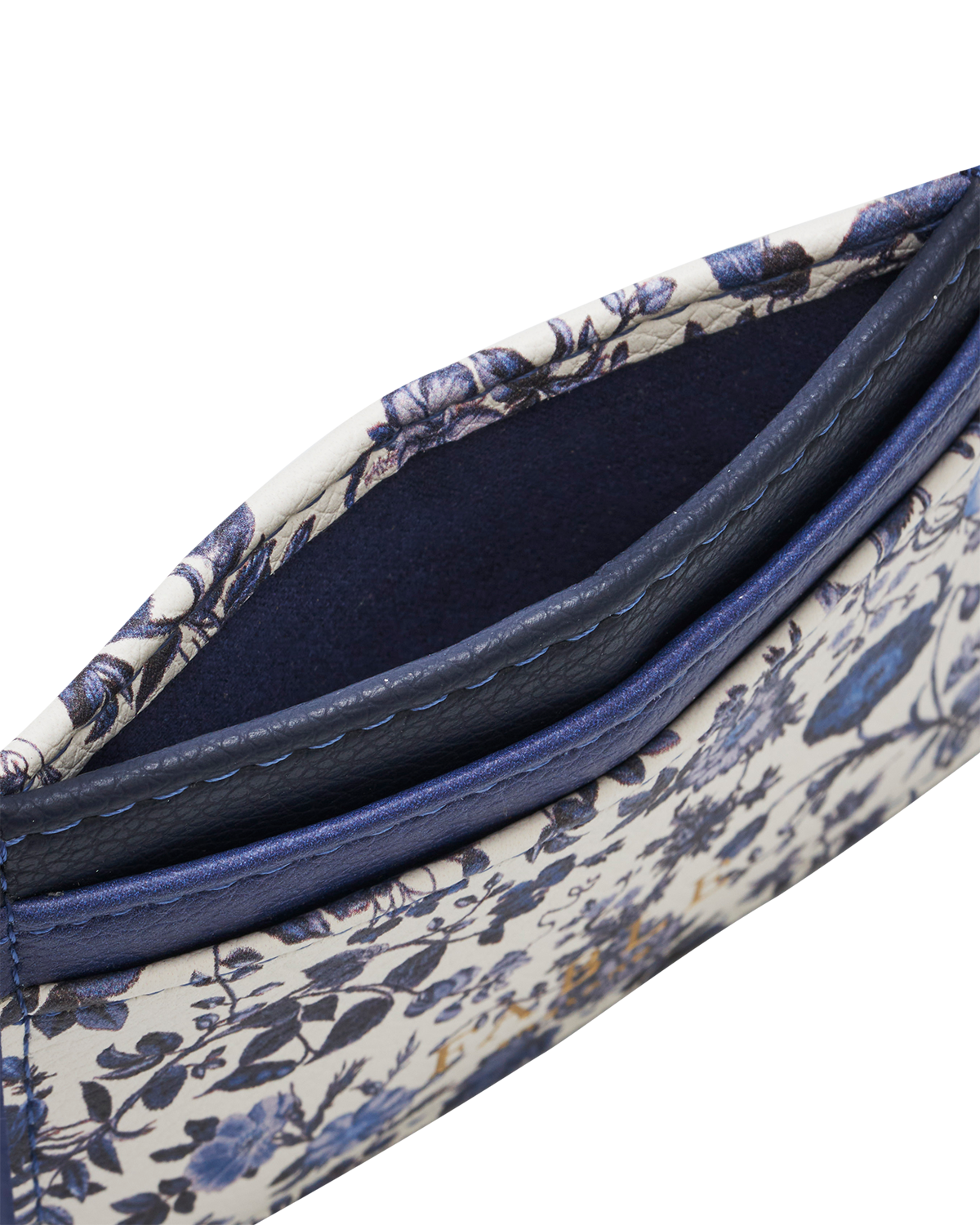 Close-up of the Blue Agnes Ditsy Card Holder showcasing its floral pattern and soft faux leather interior.