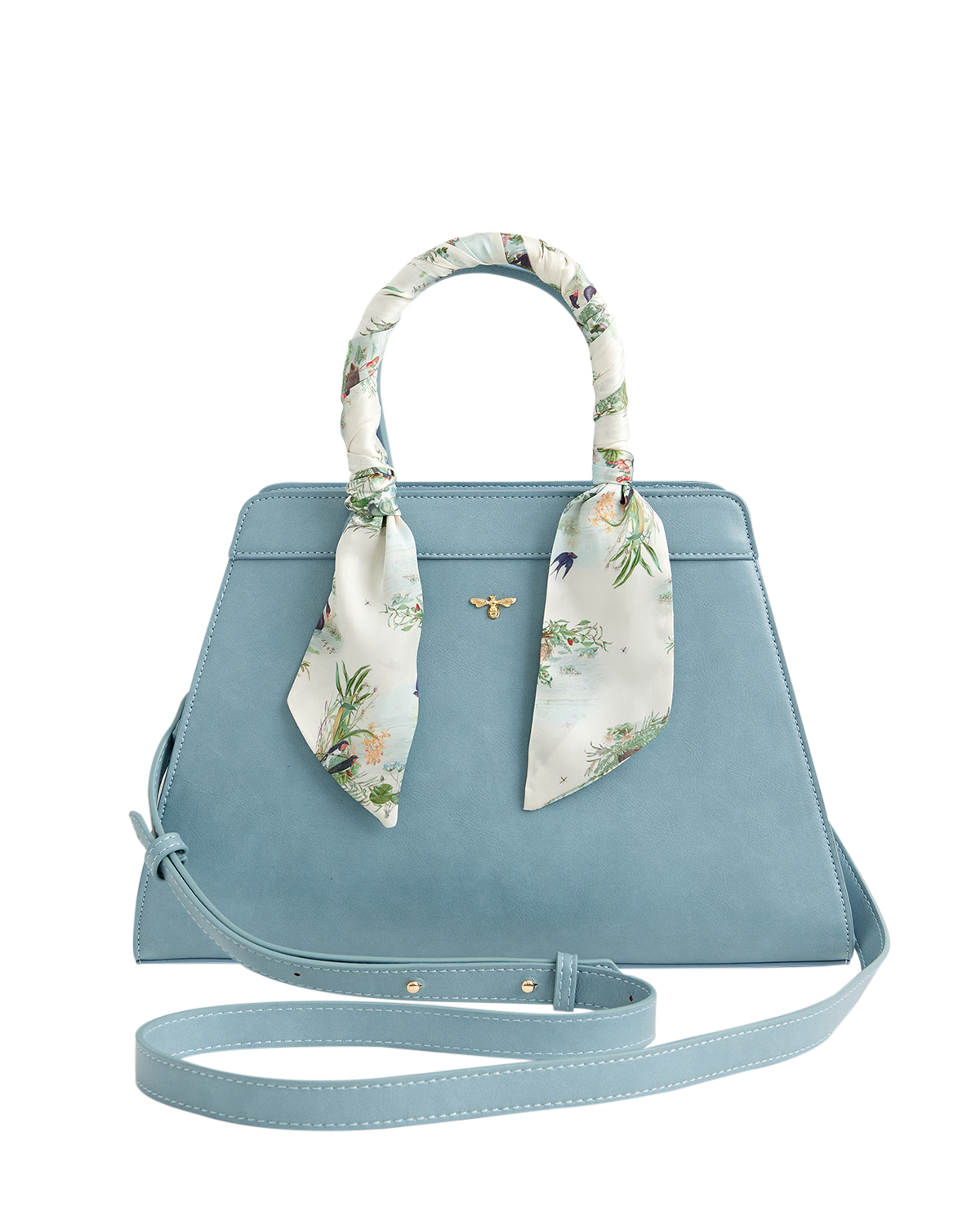 Blue handbag with floral handle wrap on a white background