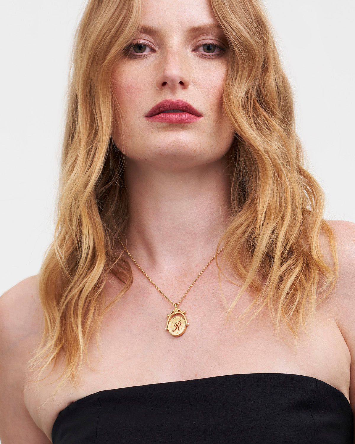 Collar Spinner Oro inicial "R" Rosa