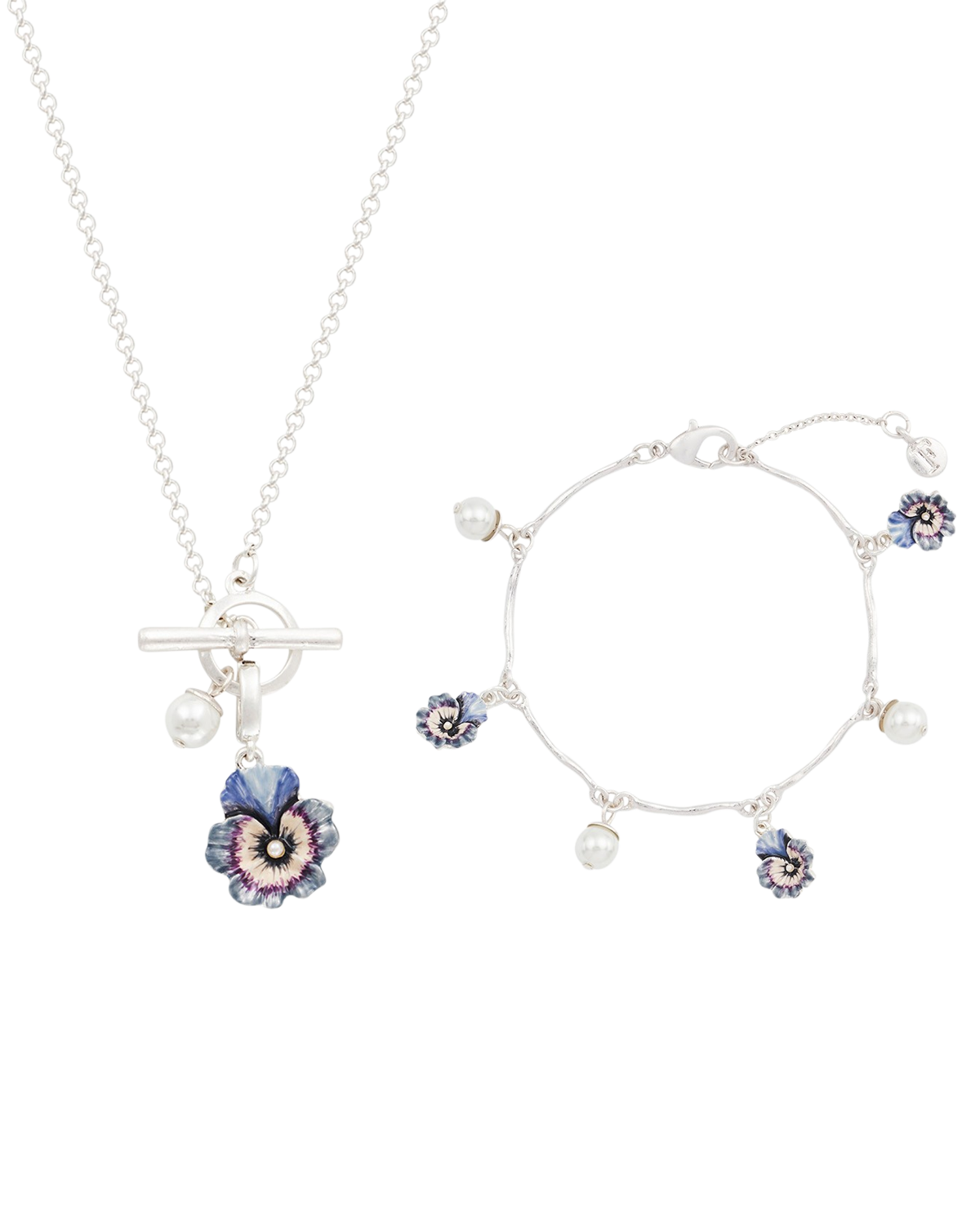 Silver jewelry set with floral charms on a white background