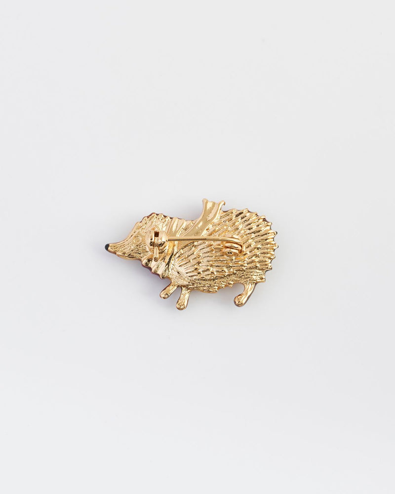 Charm brooch online