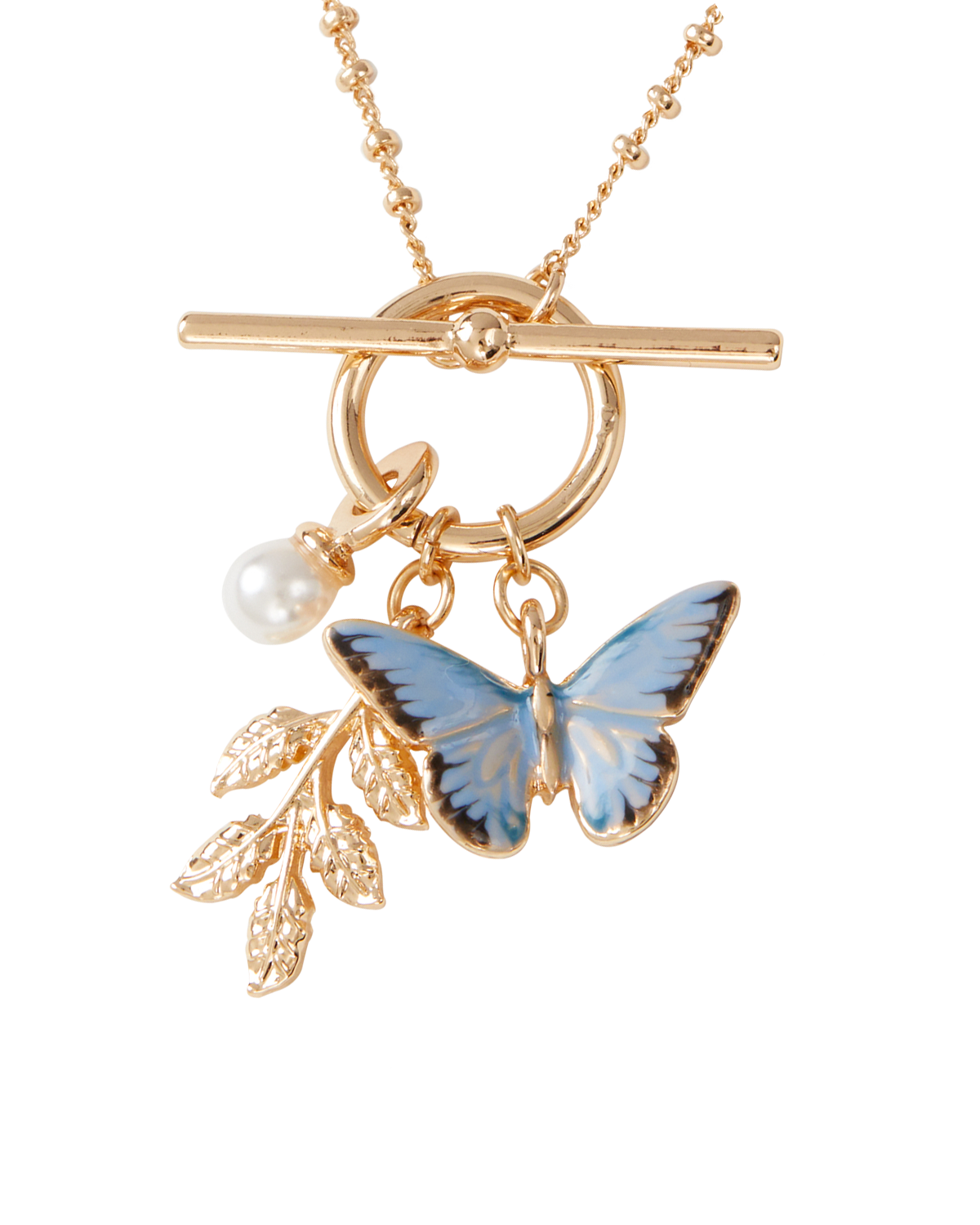 Gold necklace with a blue butterfly pendant, pearl, and leaf charm on a white background