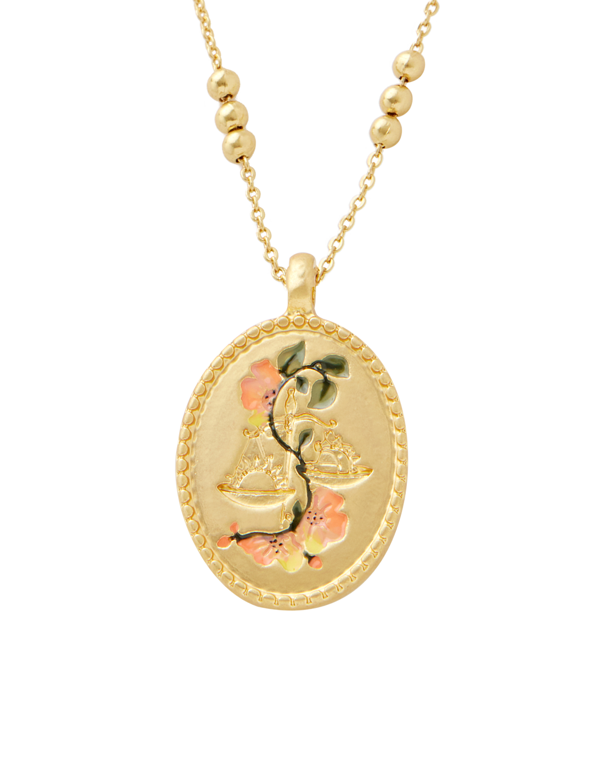 Gold Libra zodiac necklace with a decorative pendant on a white background