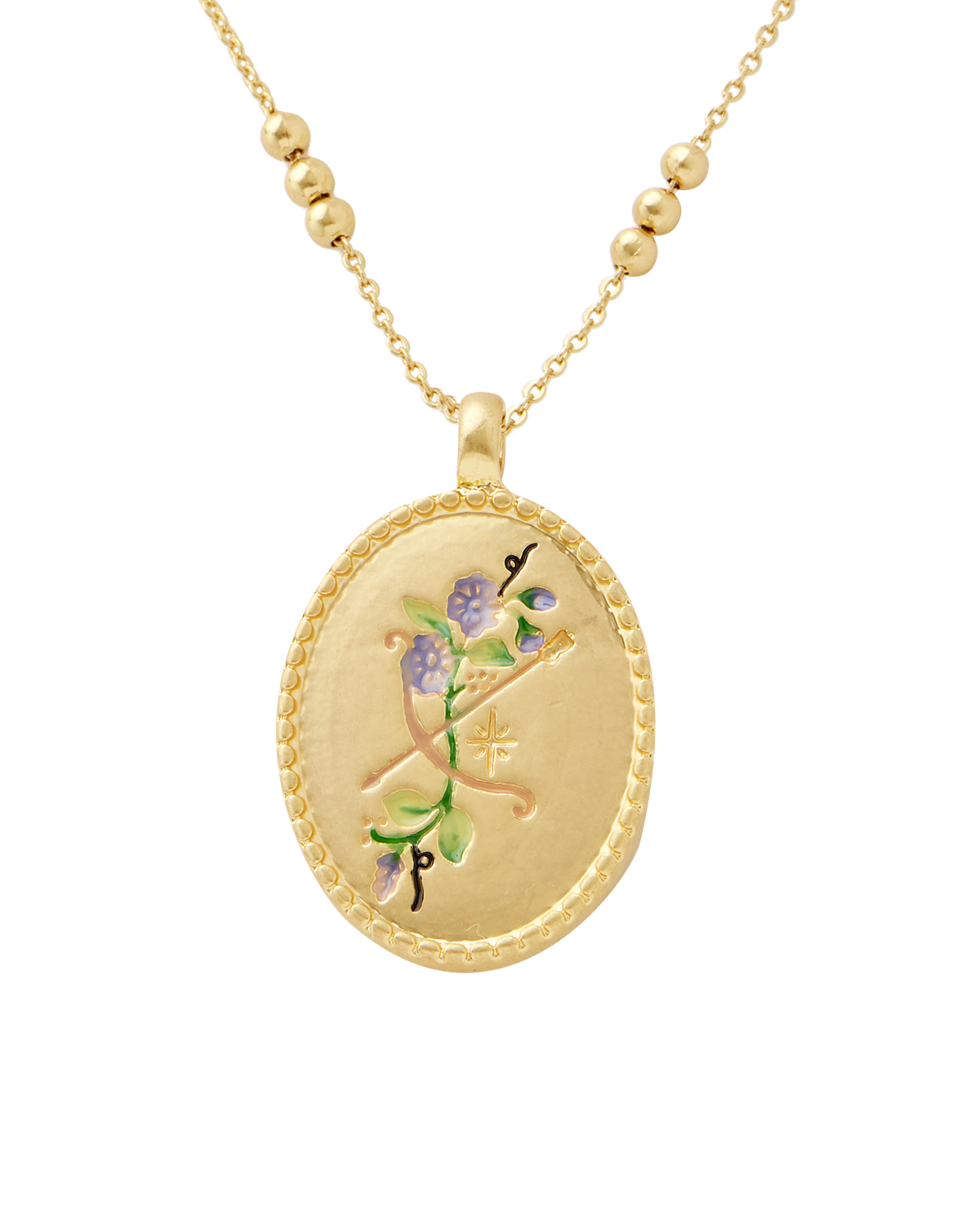Gold sagittarius zodiac necklace with a decorative pendant featuring floral designs on a white background