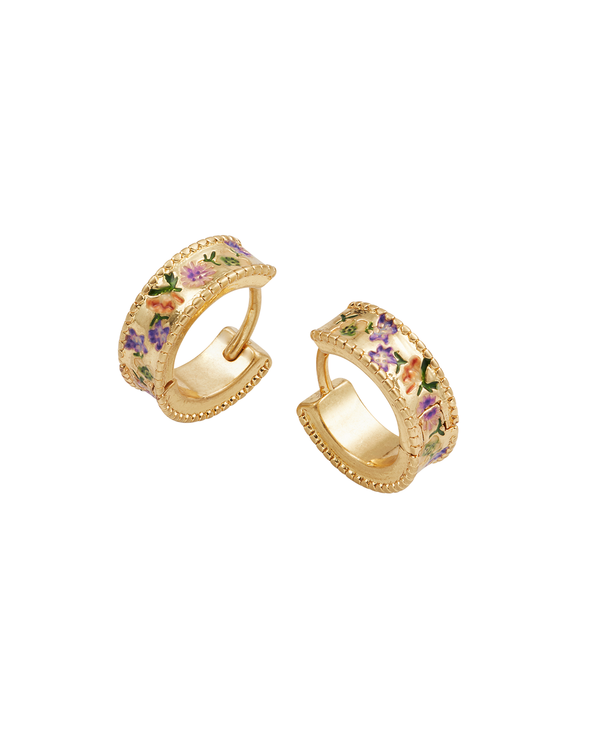 Gold hoop earrings with floral designs on a white background