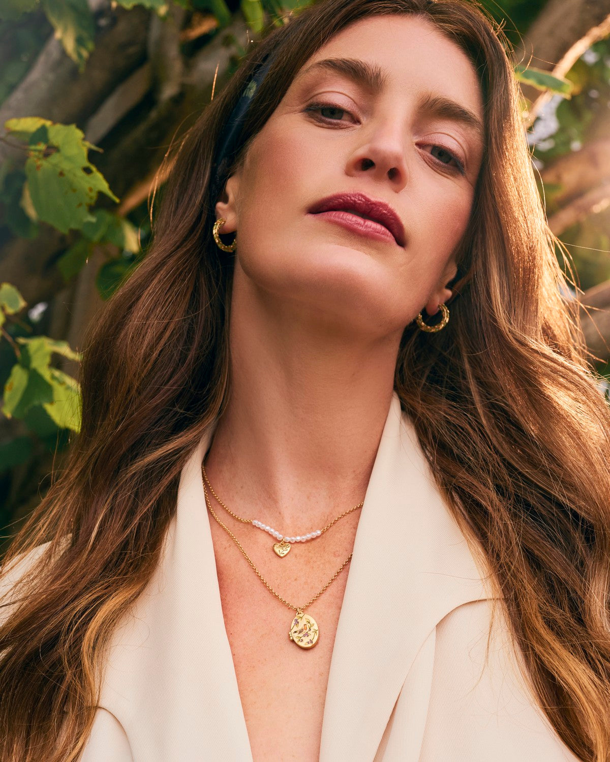 Gold Robin & Blackberry Locket Necklace and Niva Mistletoe Heart & Pearl Necklace in Gold styled