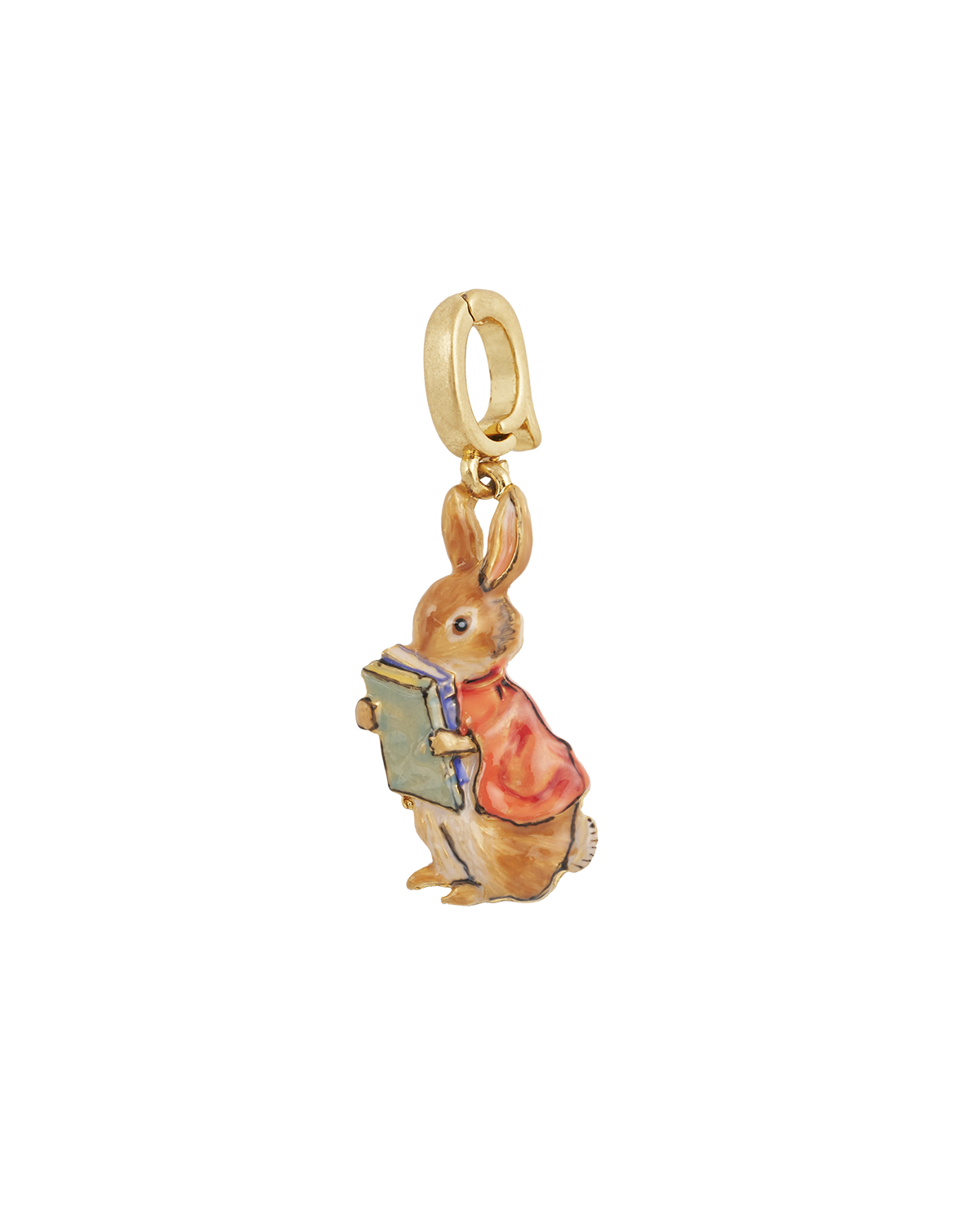 Gold charm of a rabbit holding a book on a white background