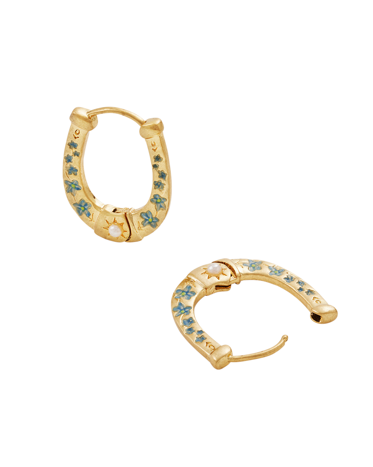 Gold hoop earrings with embedded stones on a white background