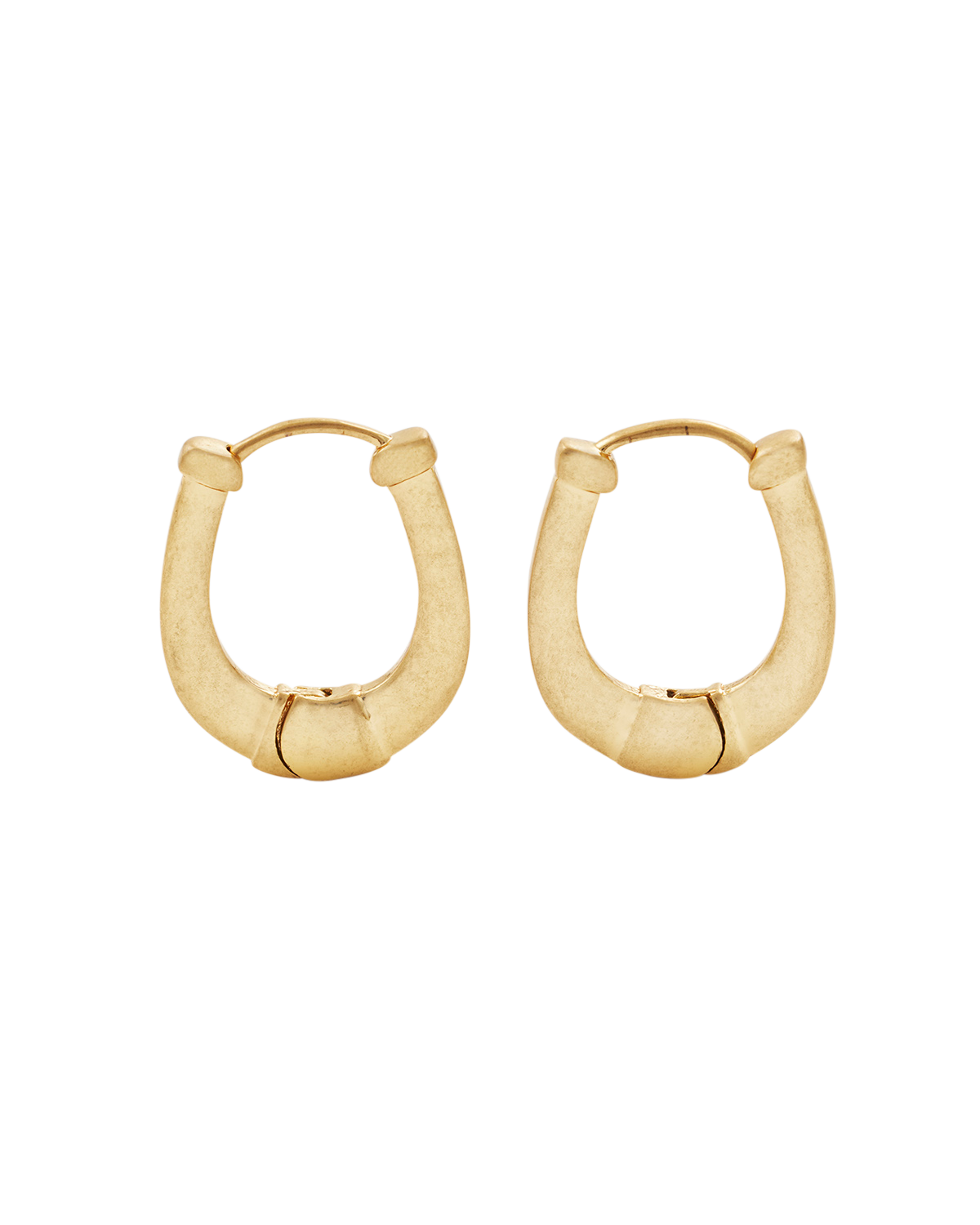 Gold horseshoe hoop earrings on a white background