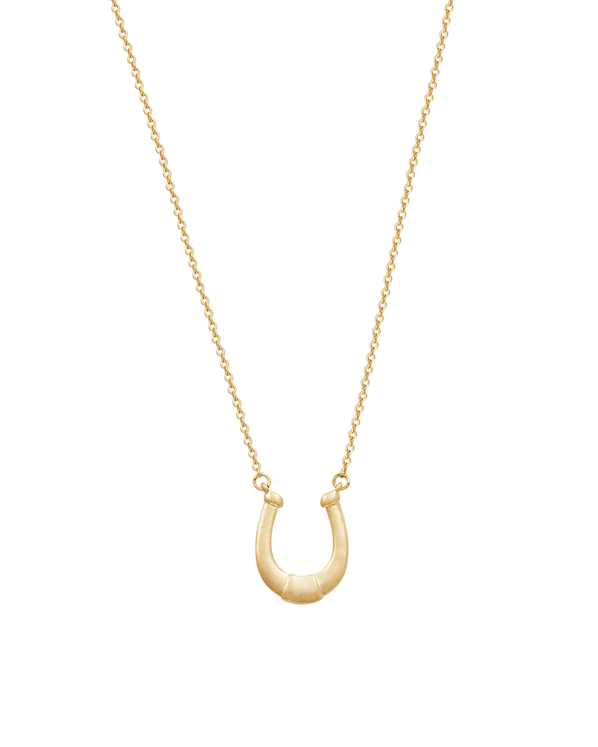 Gold Lucky in Love Necklace featuring a horseshoe charm on a delicate gold chain.