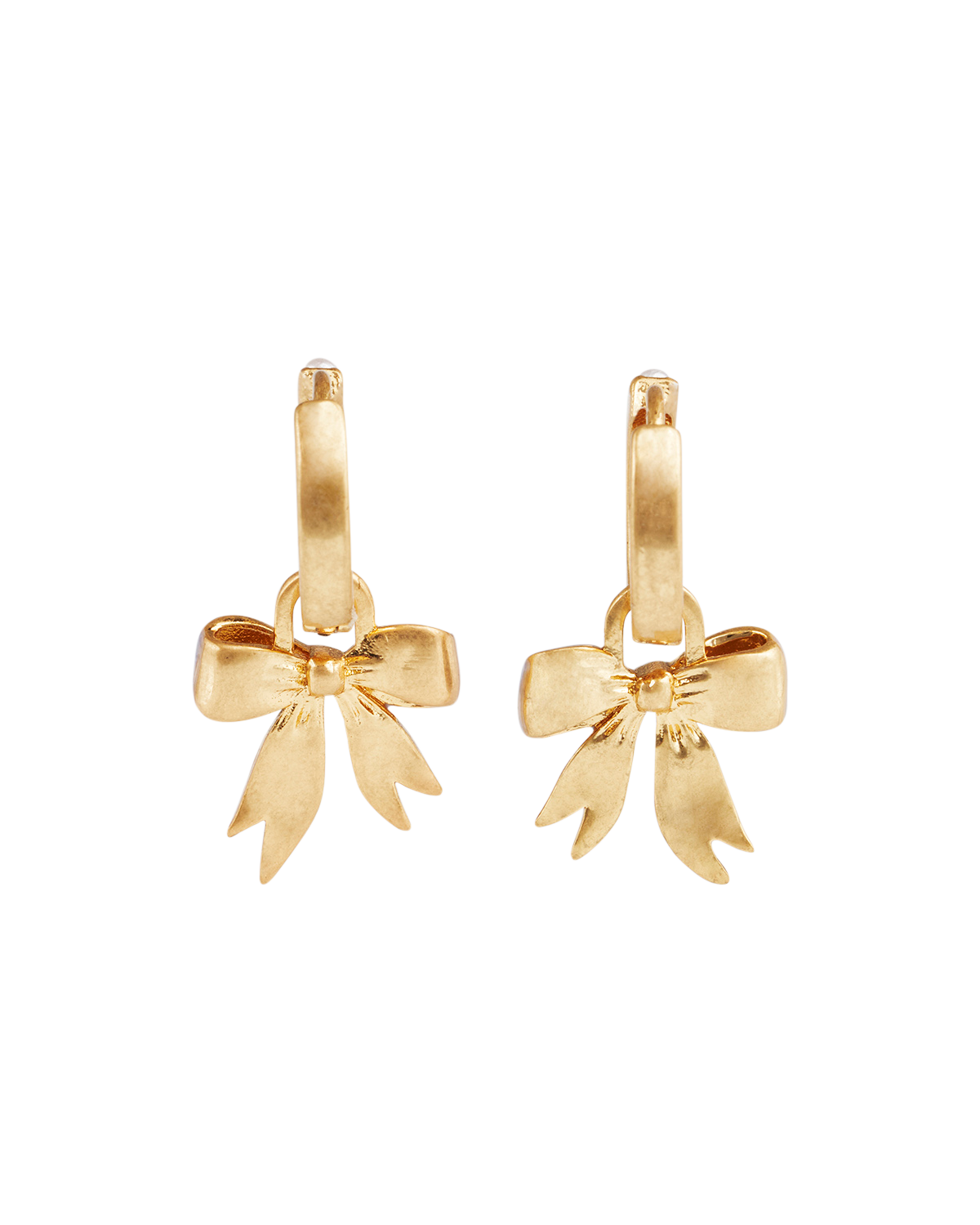 Gold Forget Me Not Bow Huggie Earrings on a white background