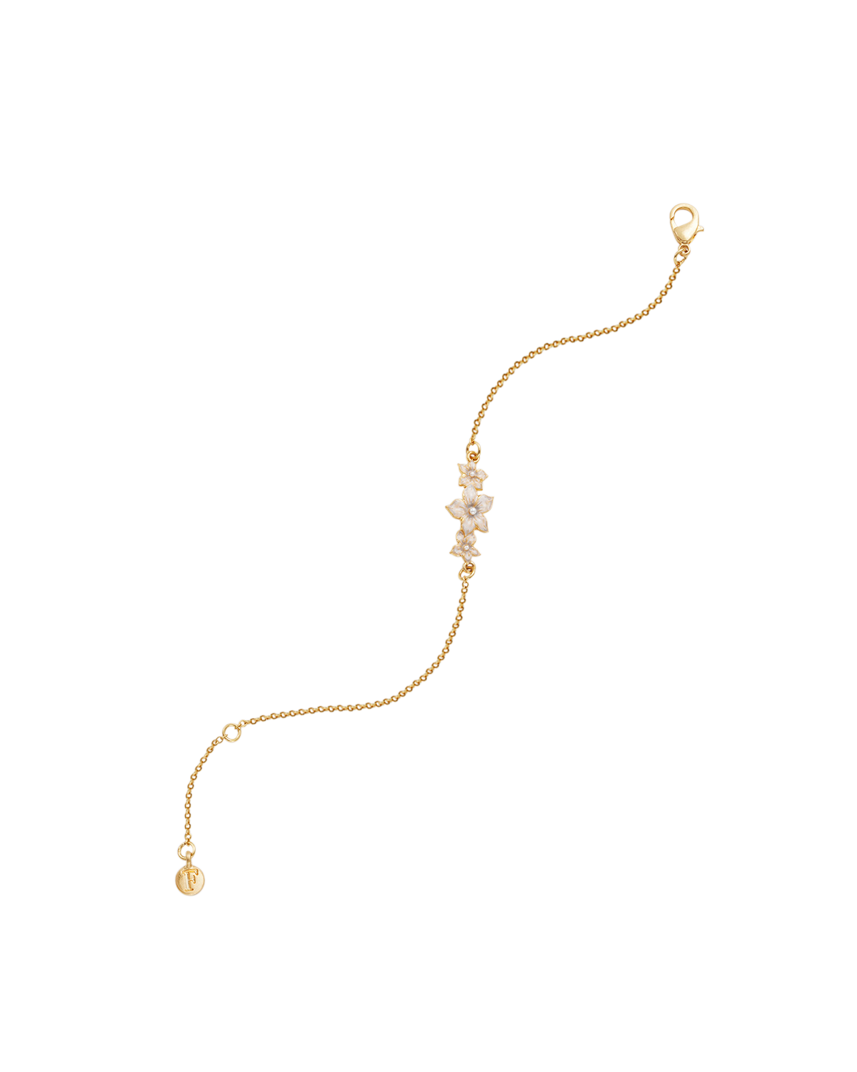 Gold bracelet with pearls on a white background