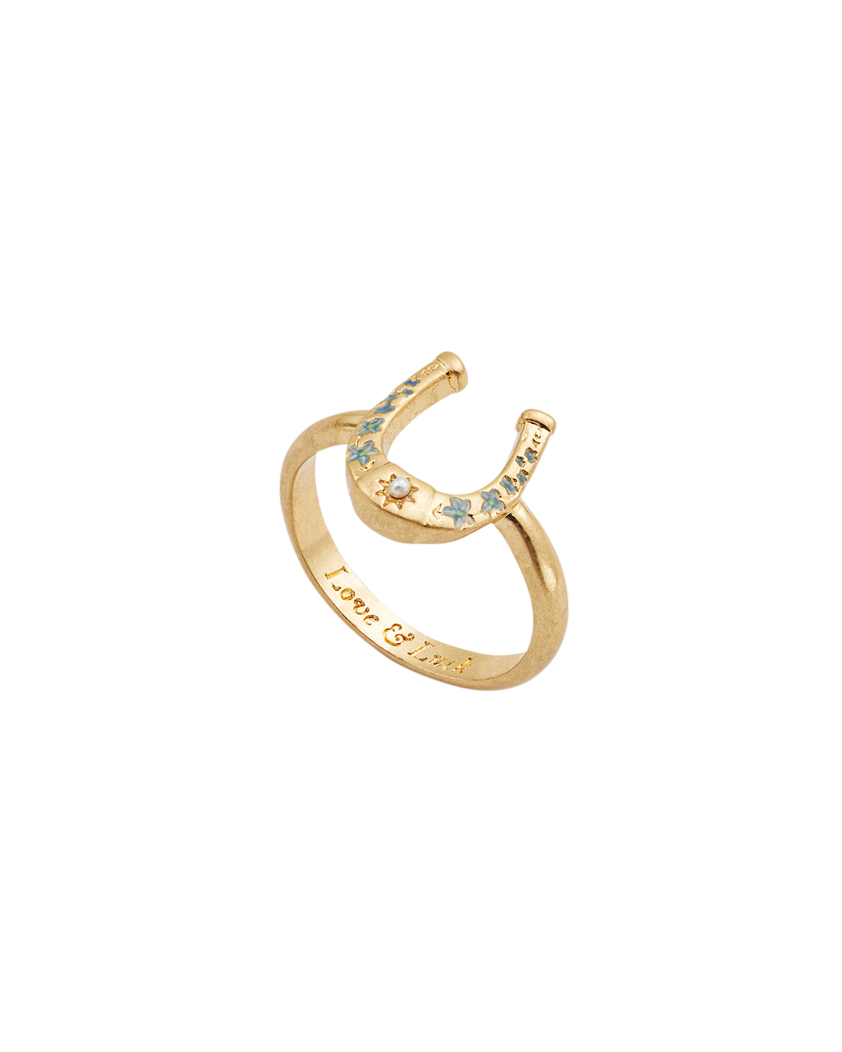 Gold ring with horseshoe shape and small stones on a white background