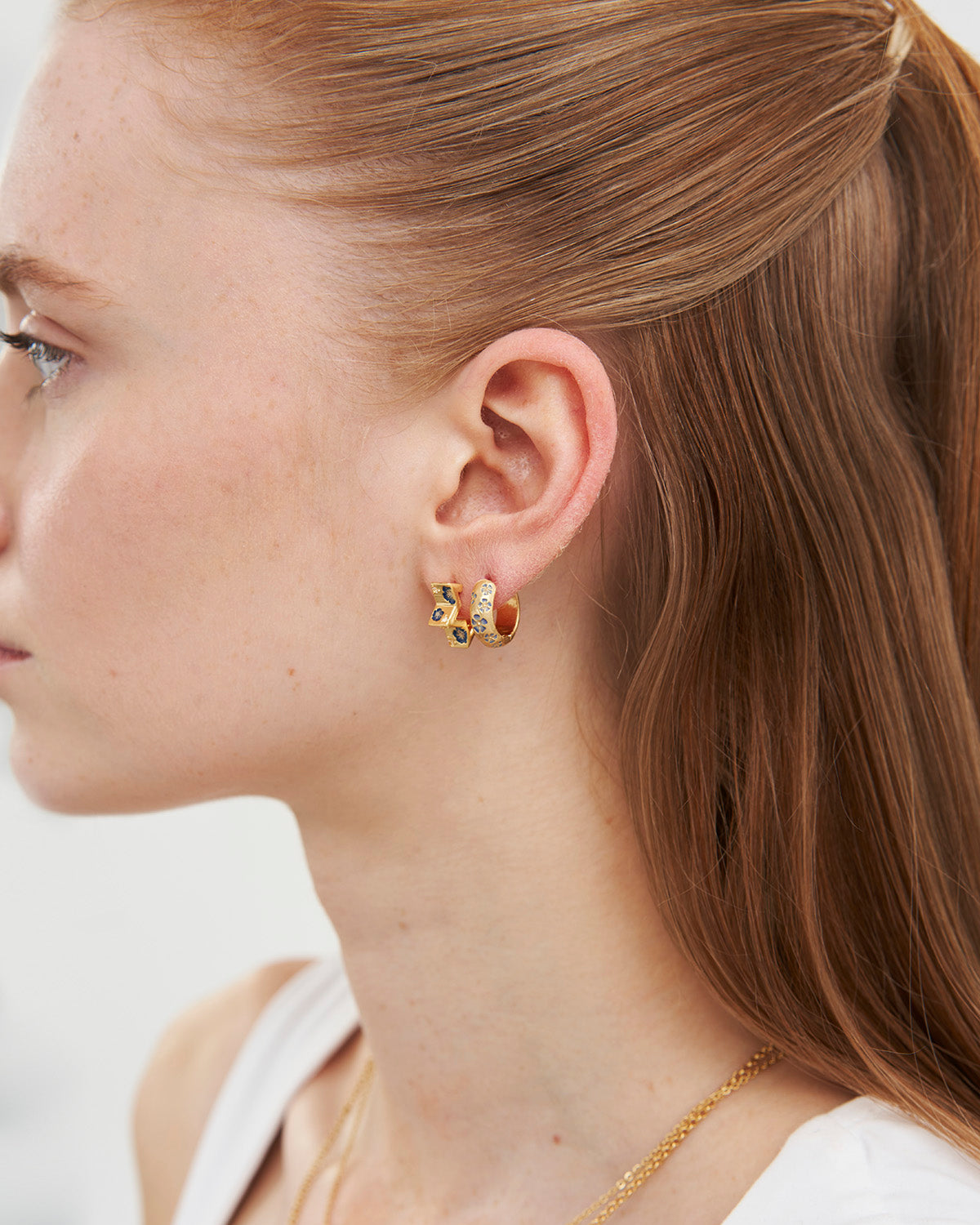 Periwinkle Huggie Earrings in Gold