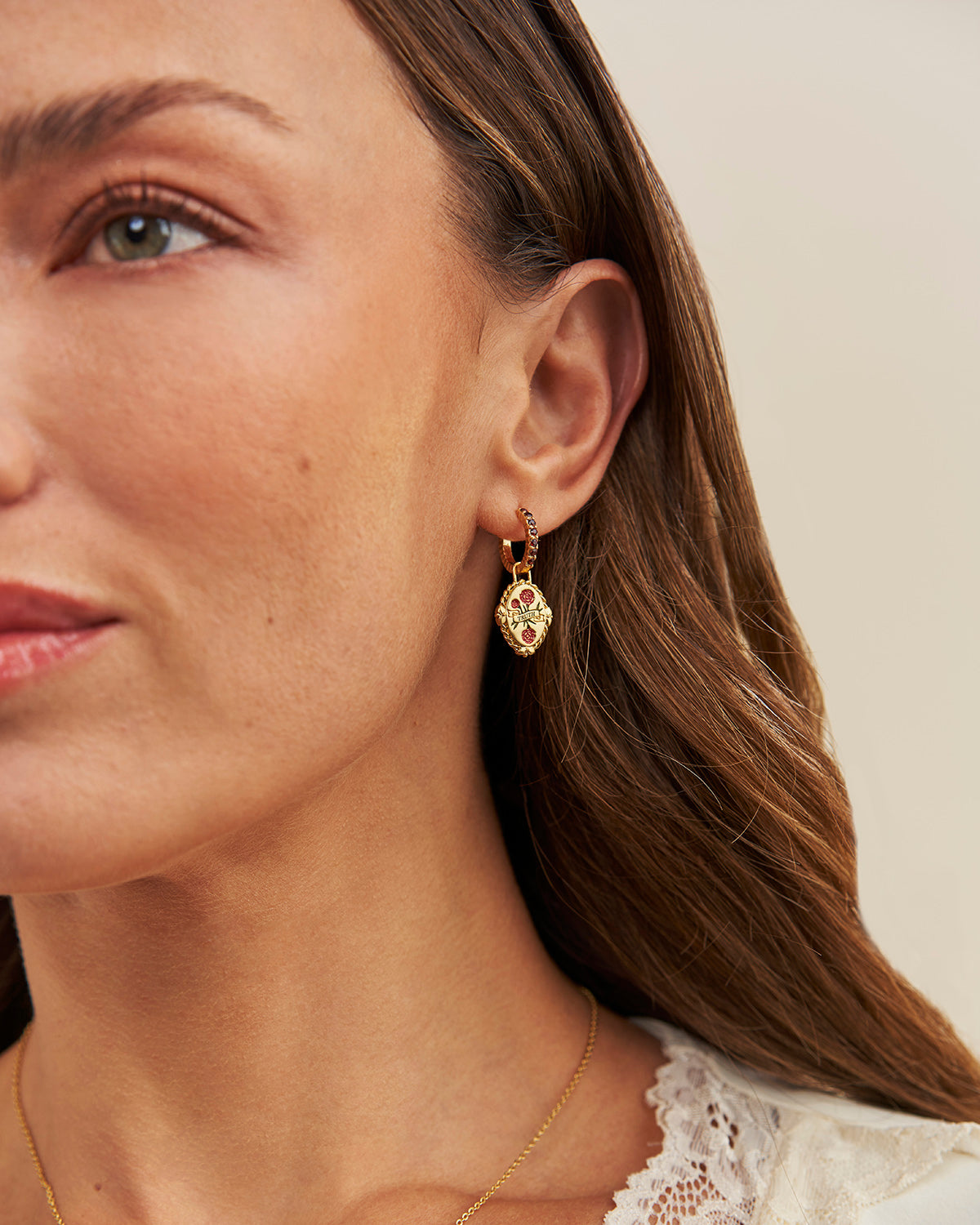 January Birthstone Carnation Huggie Earrings – model shot
