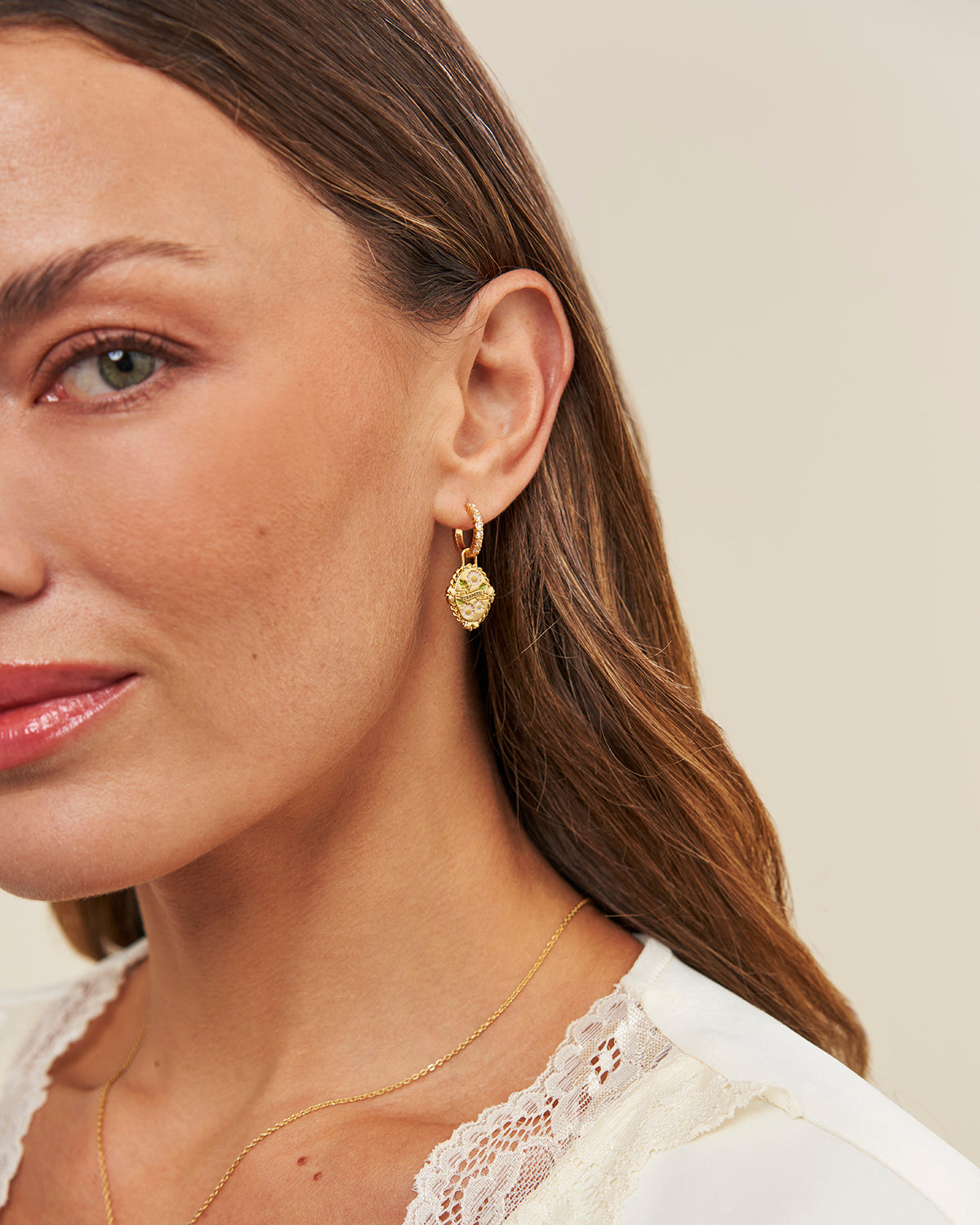 April Birthstone Daisy Huggie Earrings – model shot