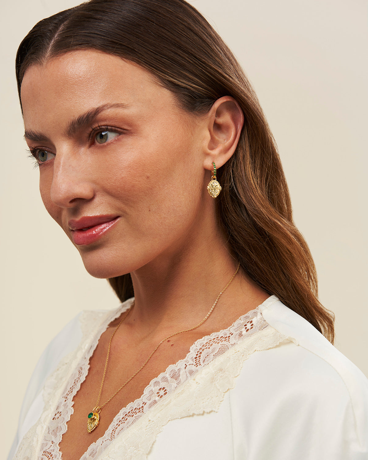 May Birthstone Lily of the Valley Huggie Earrings – model shot