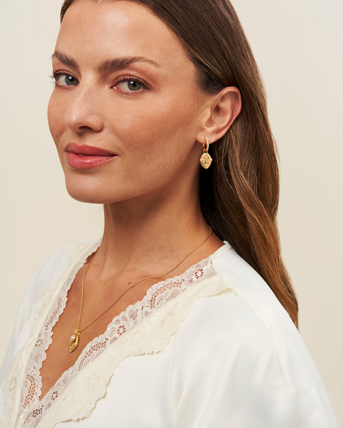 June Birthstone Rose Huggie Earrings – model shot