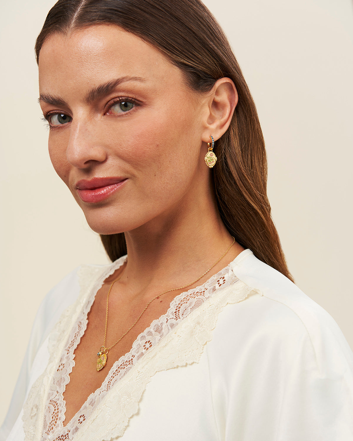 September Birthstone Aster Huggie Earrings – model shot