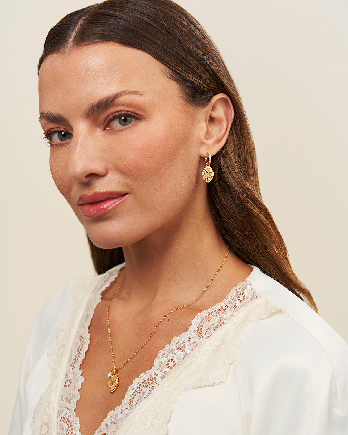 October Birthstone Cosmos Huggie Earrings – model shot