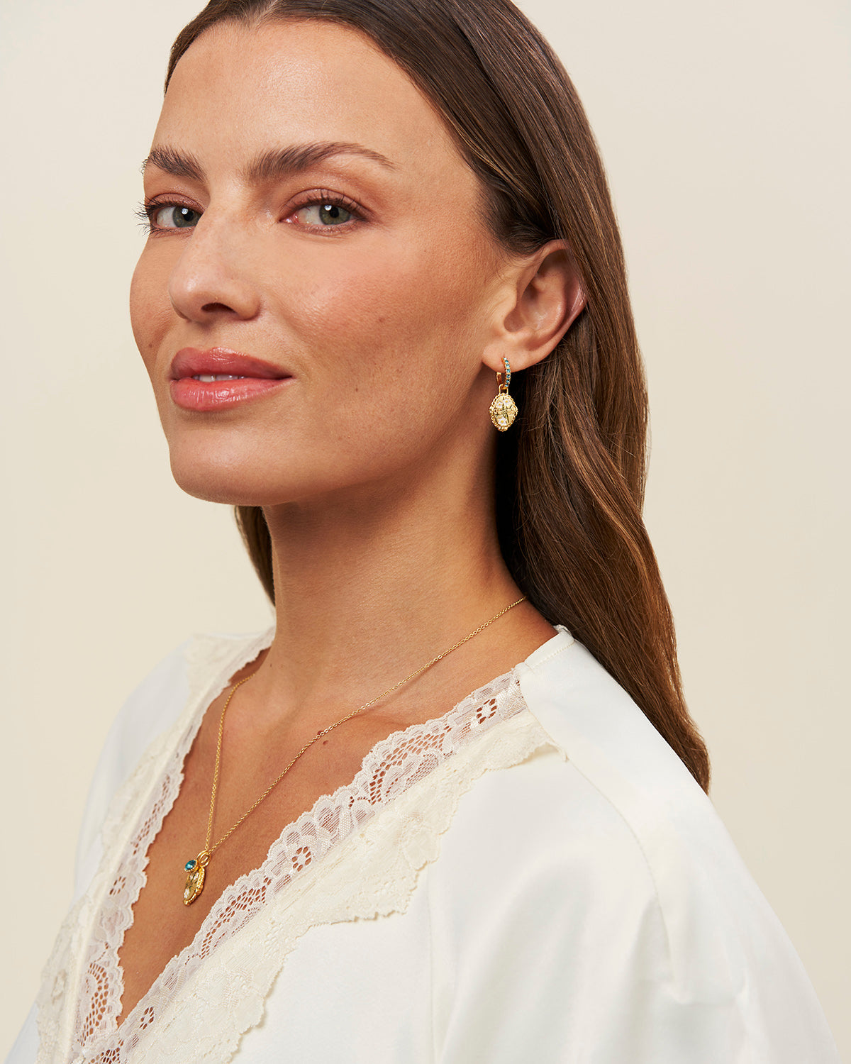 December Birthstone Narcissus Huggie Earrings – model shot