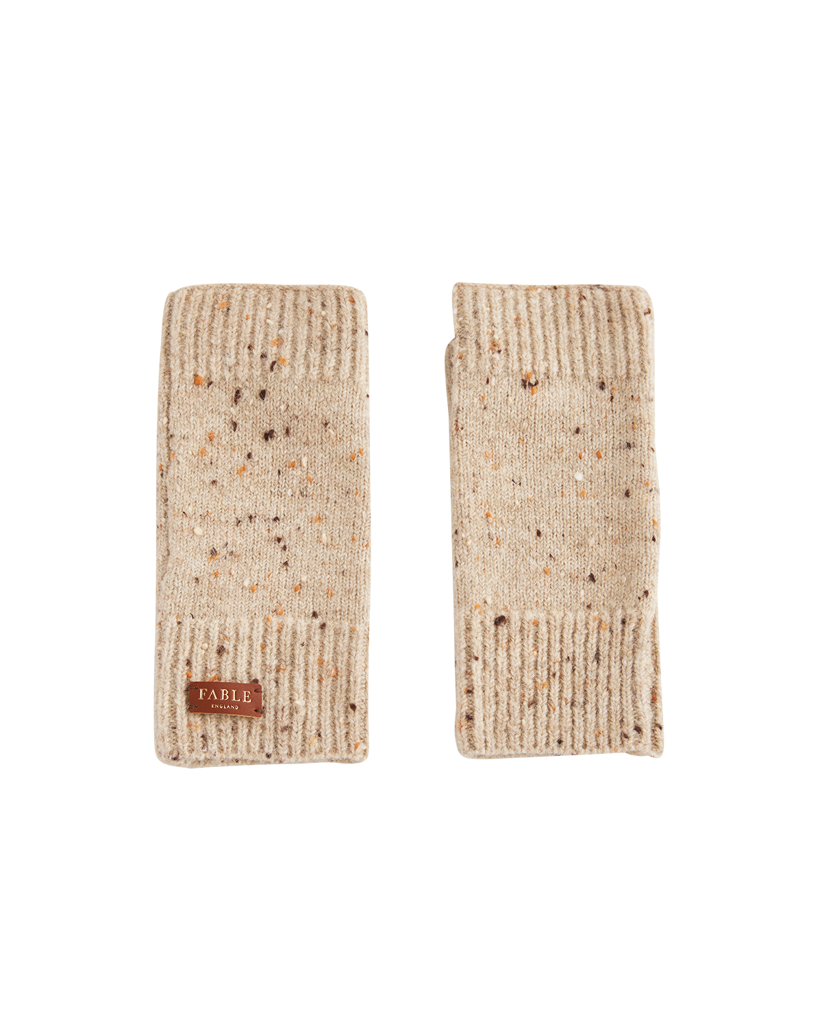 Pair of beige knitted fingerless gloves with Fable England brand label on a white background