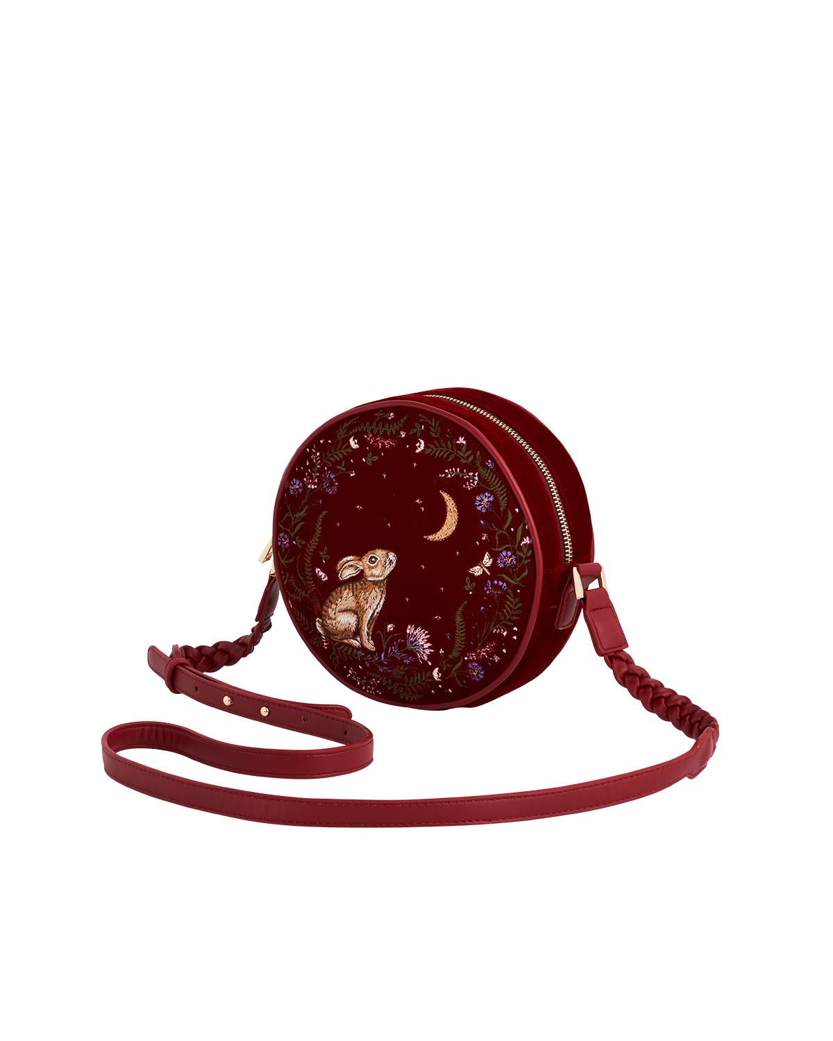 Round red bag with rabbit and celestial design on a white background