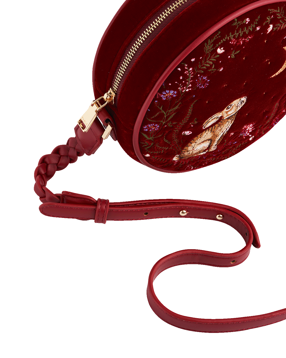 Red round bag with embroidered design on a white background