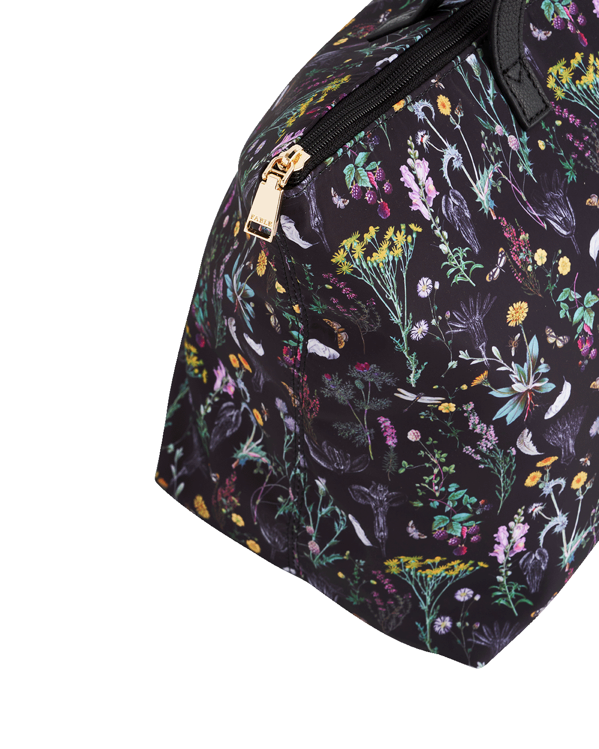 Floral-patterned bag with a gold zipper on a white background