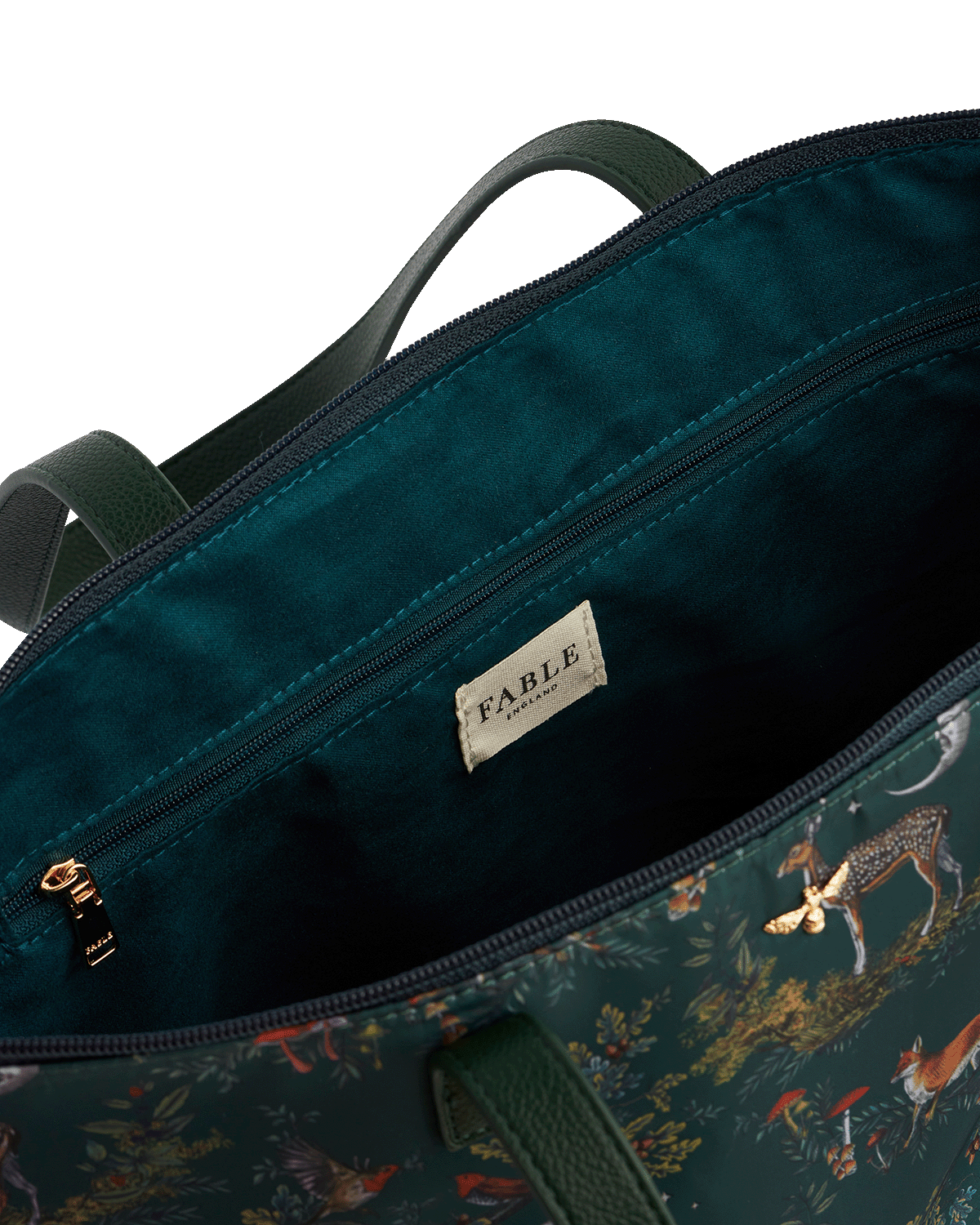 Teal bag with animal pattern and 'Fable England' brand label on a white background